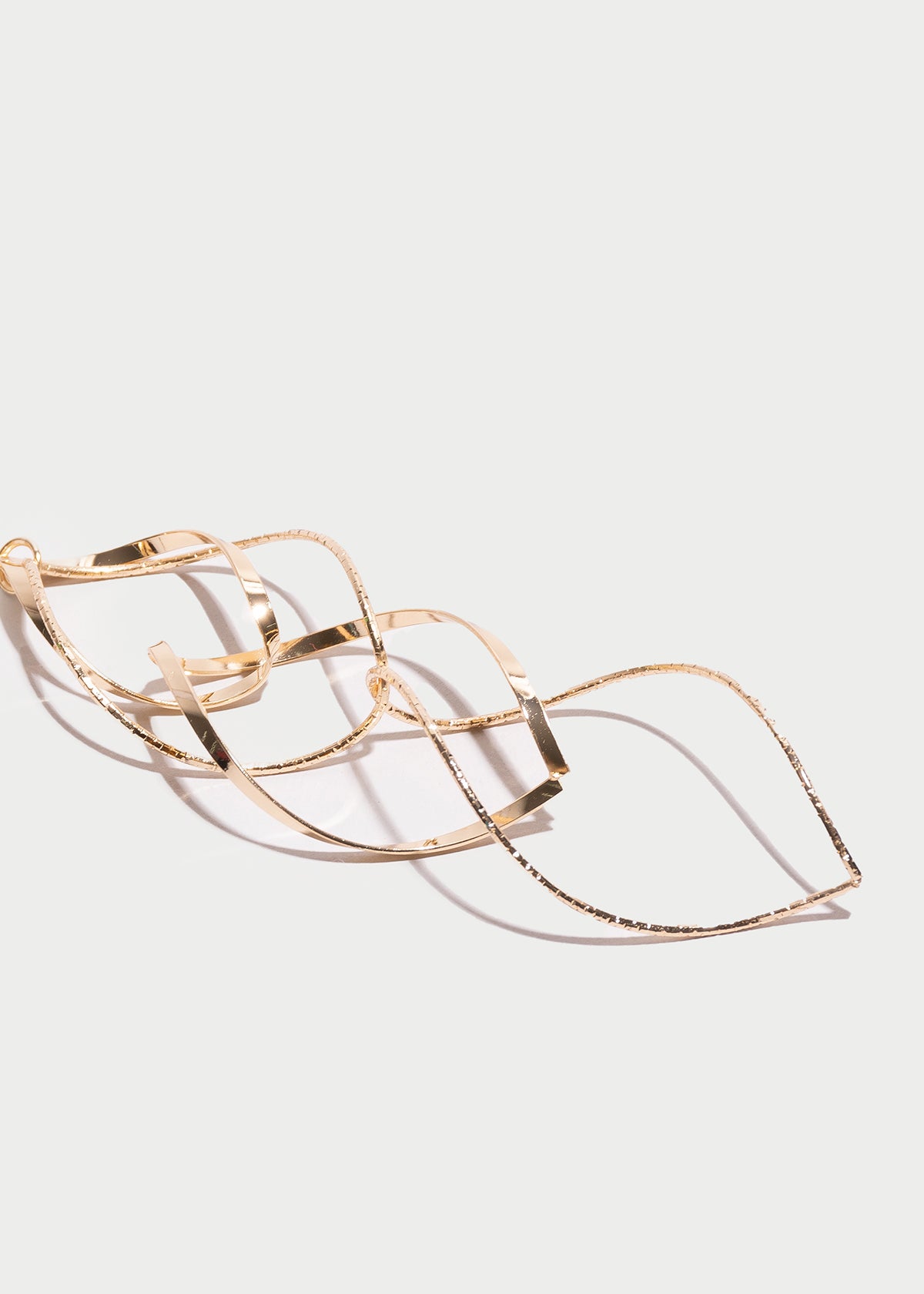 Aretes colgantes twist ORO