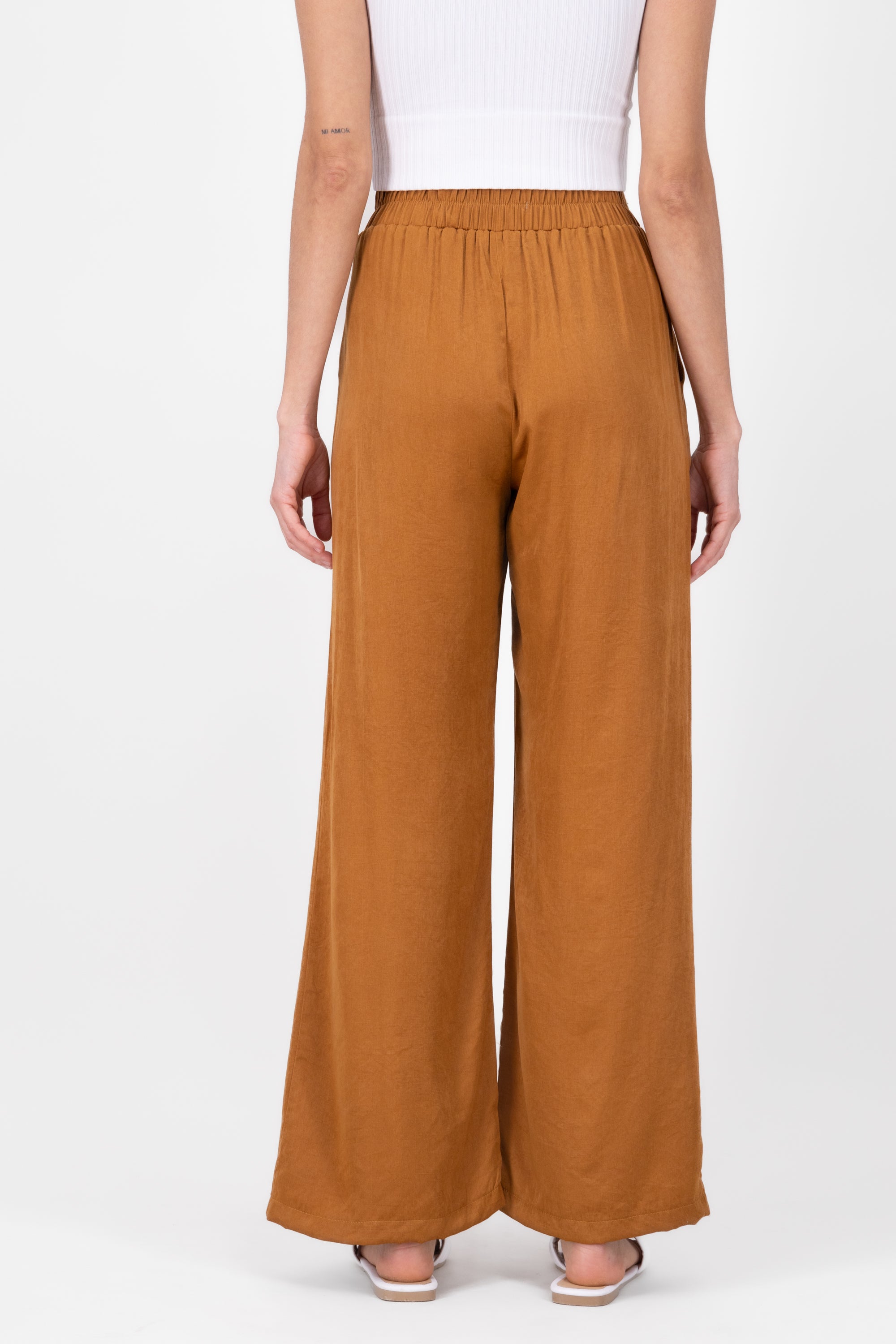 Pantalon fluido detalle boton COBRE