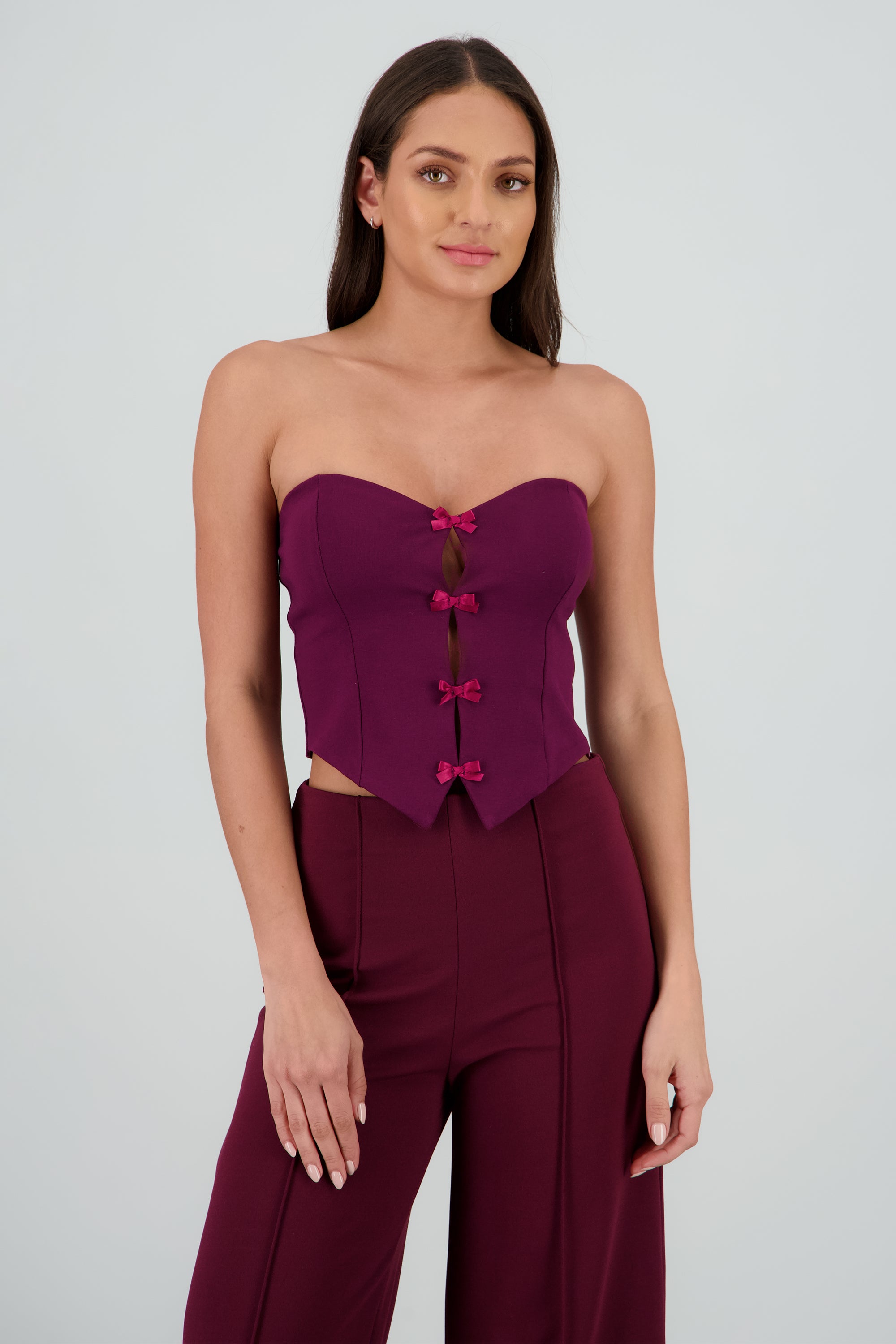 Top strapless detalle moños CIRUELA