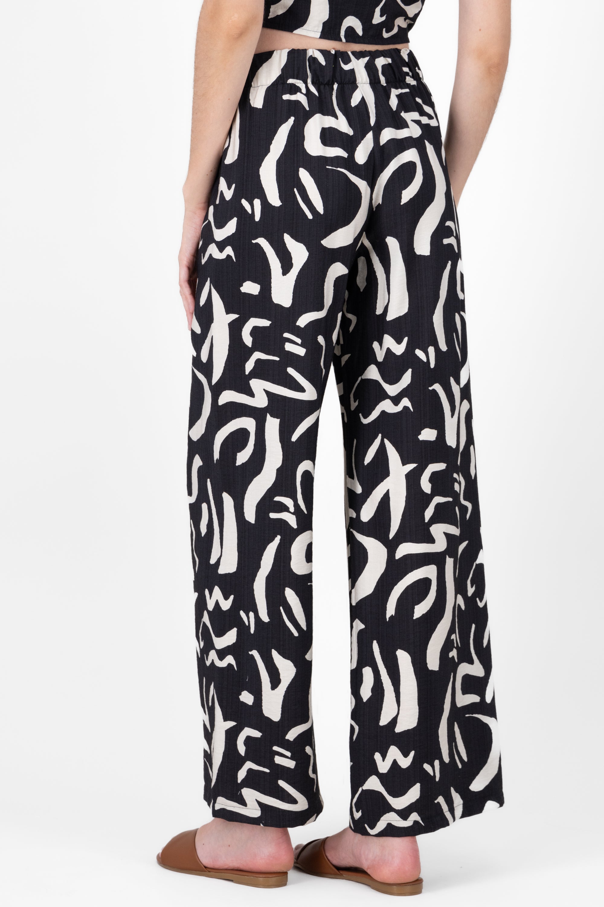 Pantalon fluido detalle estampado NEGRO COMBO