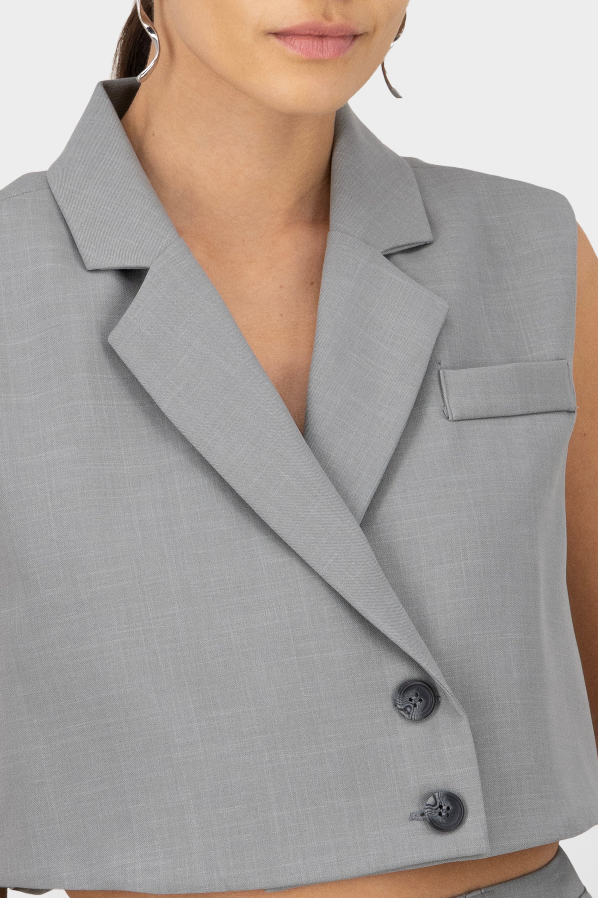 Crucked tailor vest with flap and butpsters button GREY