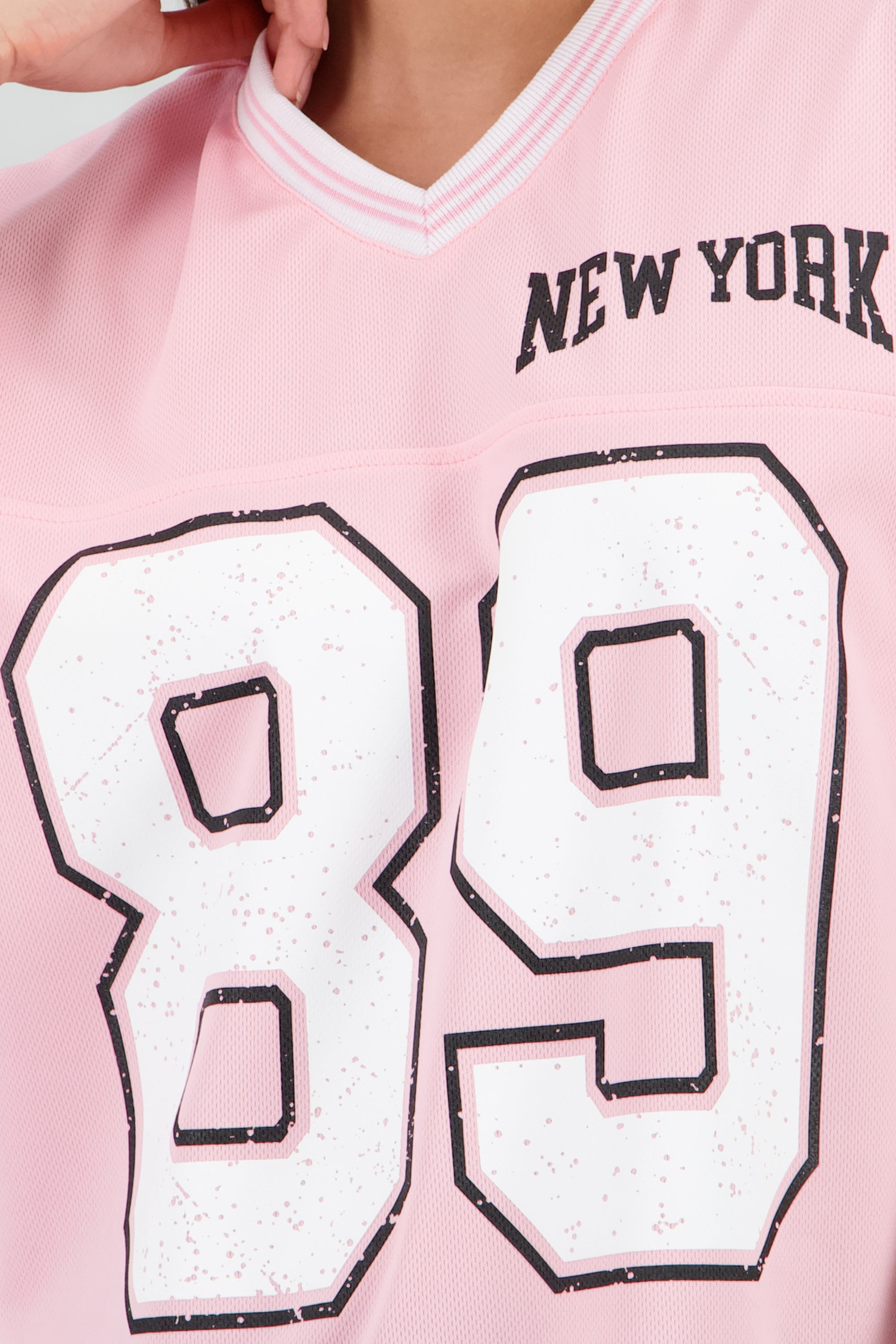 Playera oversize estampado numero ROSA PASTEL