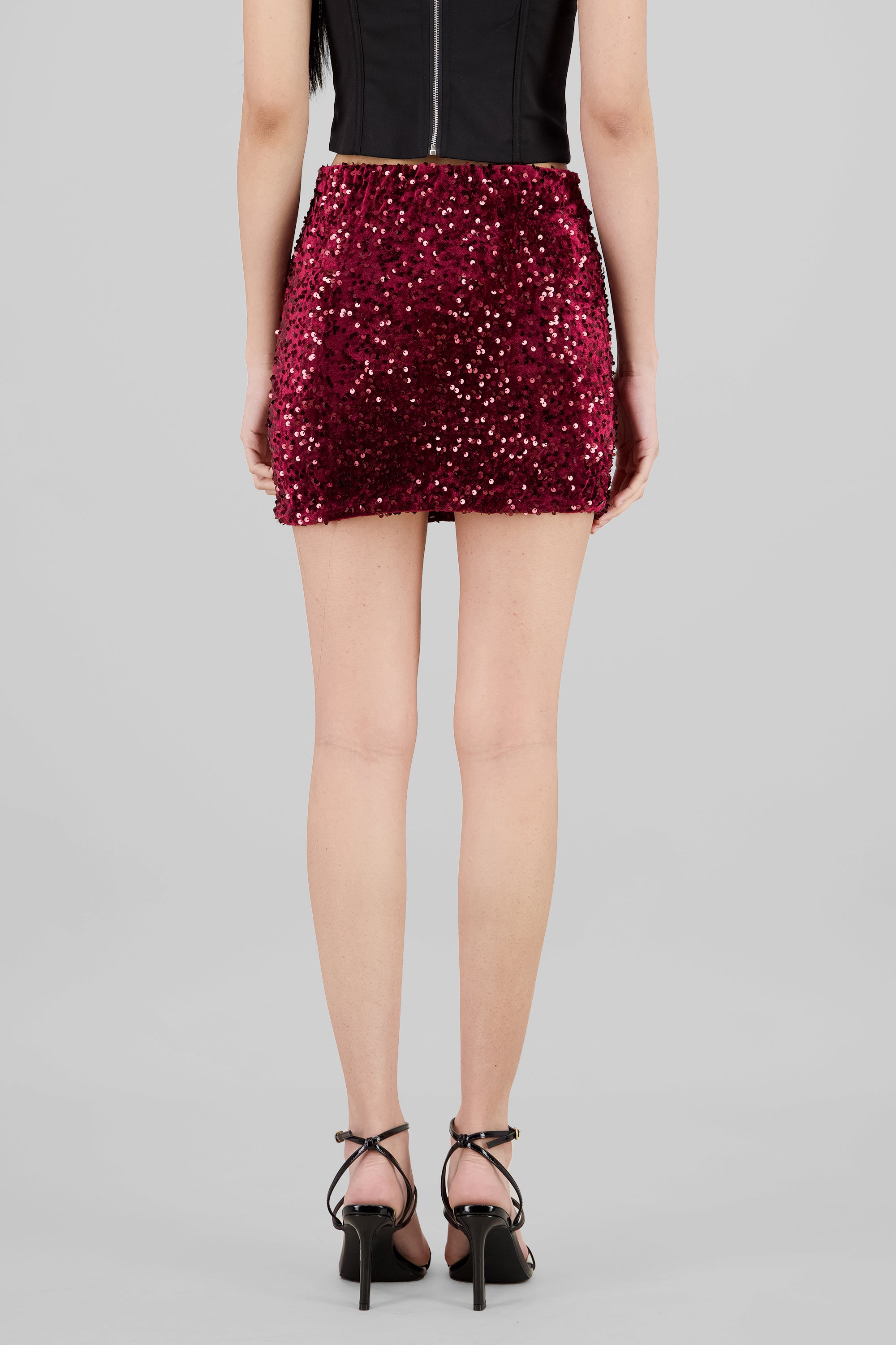 Falda mini lentejuelas CIRUELA