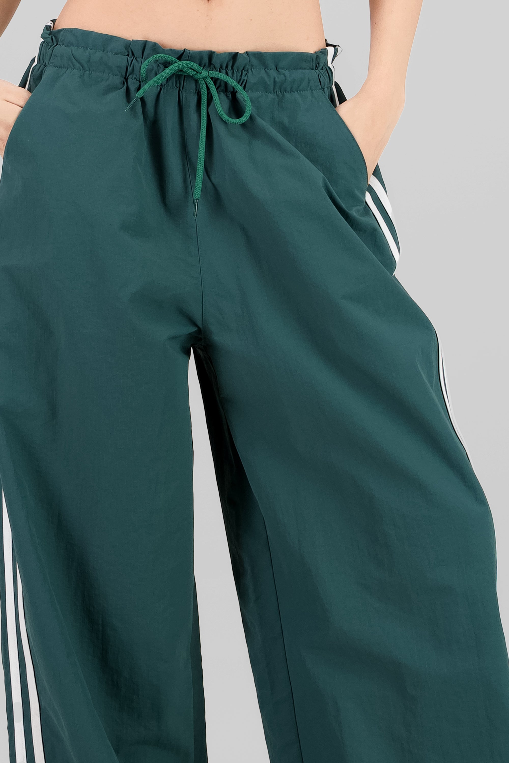 Pantalon rayas laterales VERDE CAZADOR