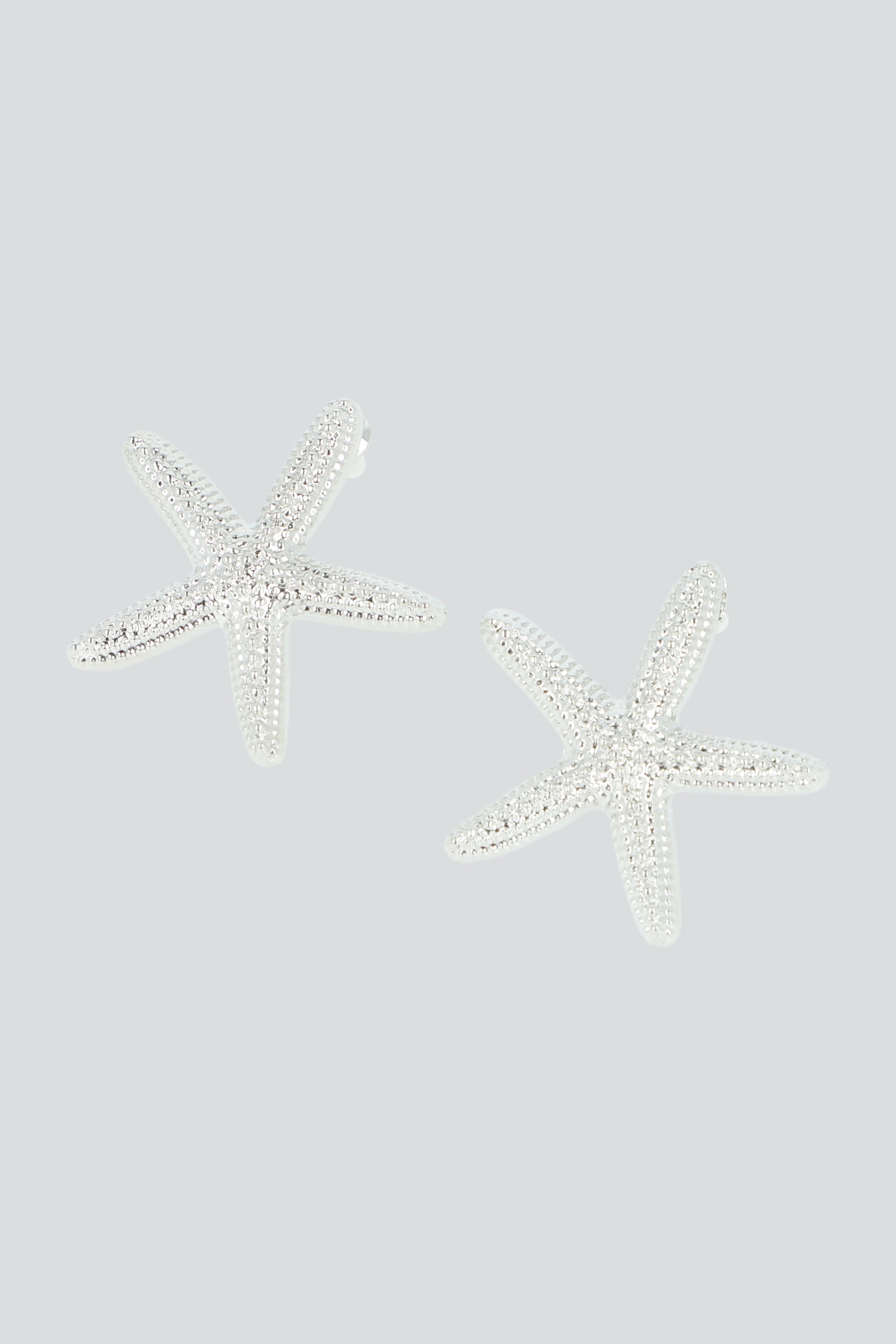 ARETES ESTRELLA DE MAR METAL PLATA