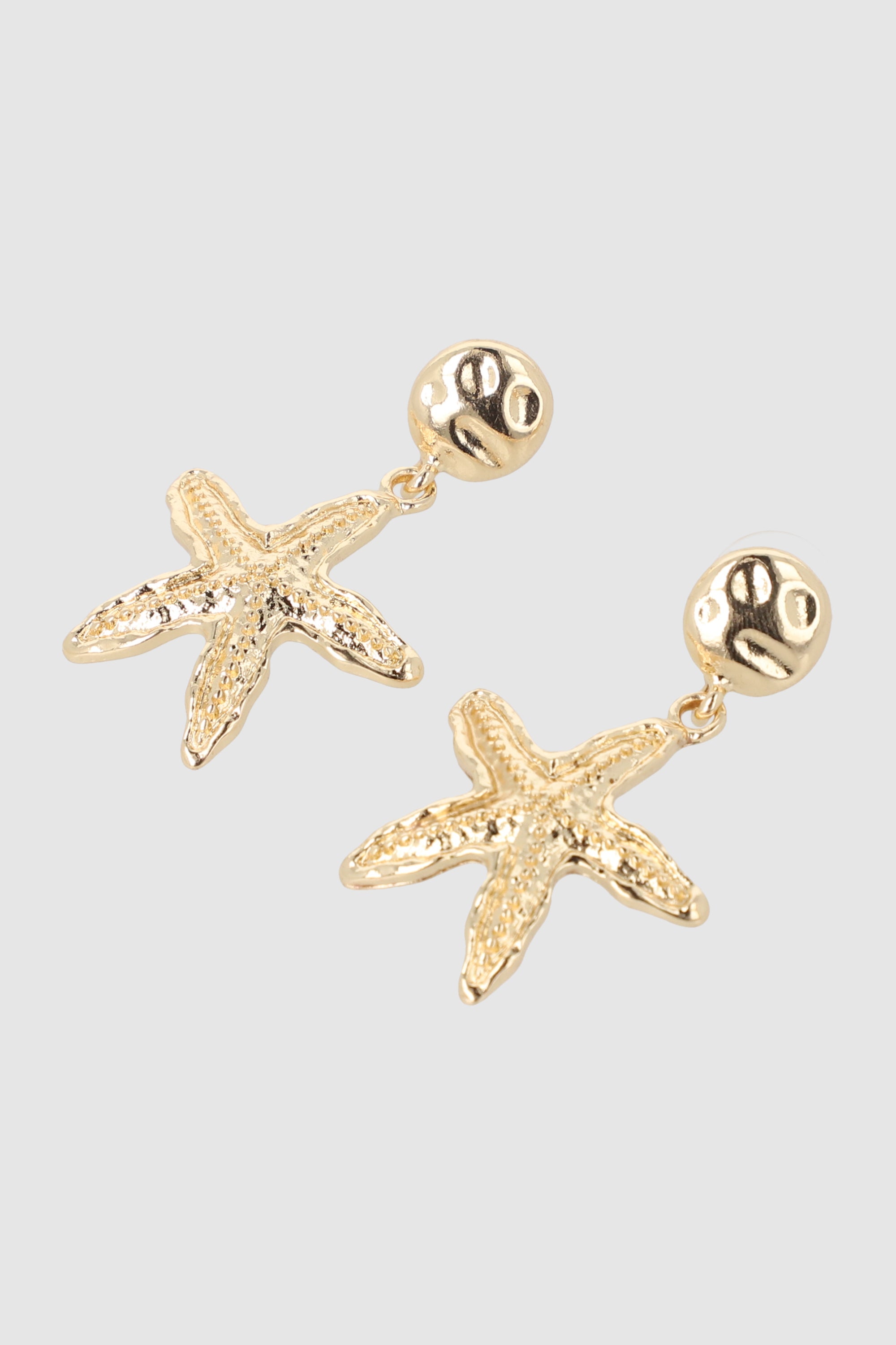 ARETES ESTRELLAS MAR METAL ORO