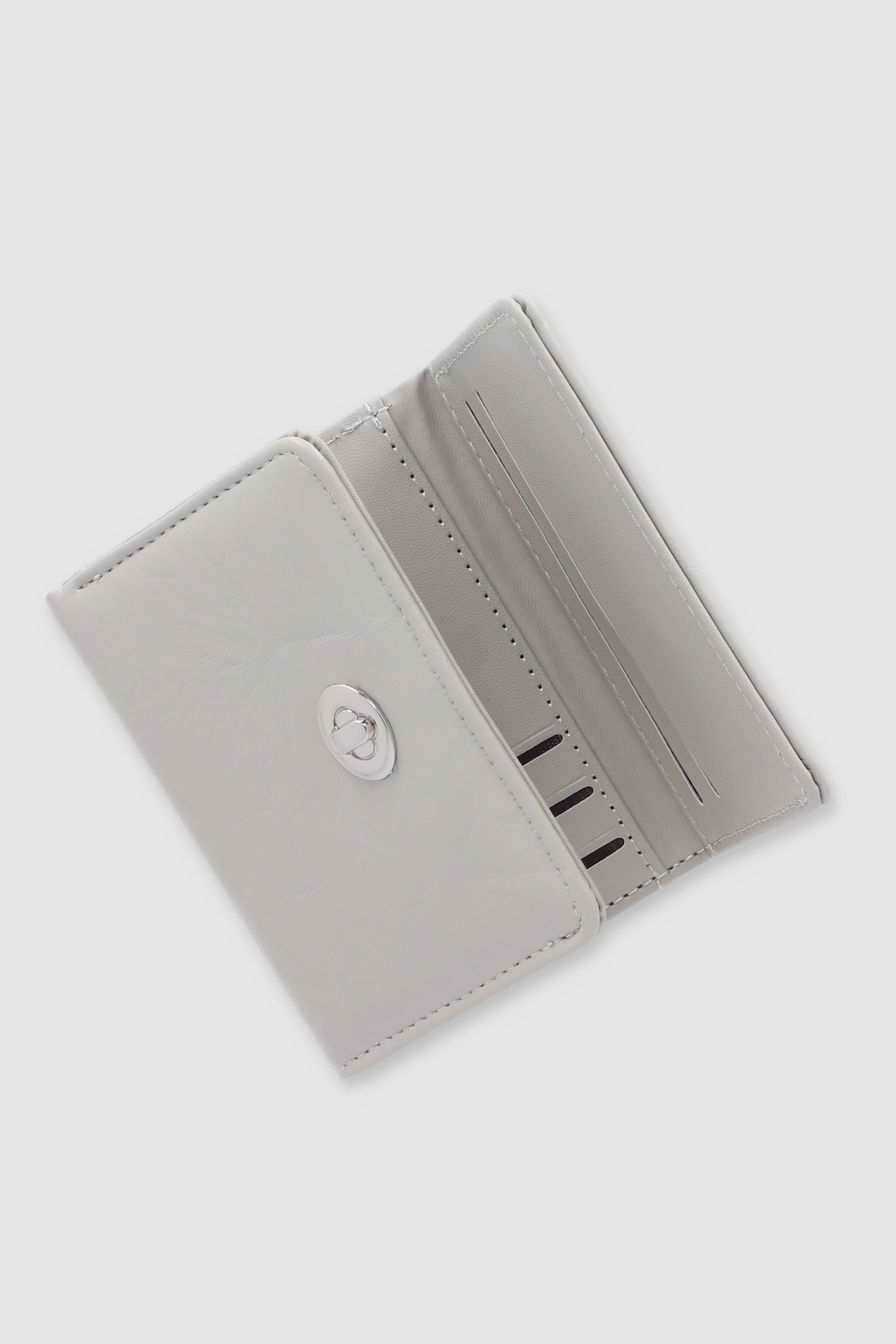 Cartera pequeña broche girable GRIS