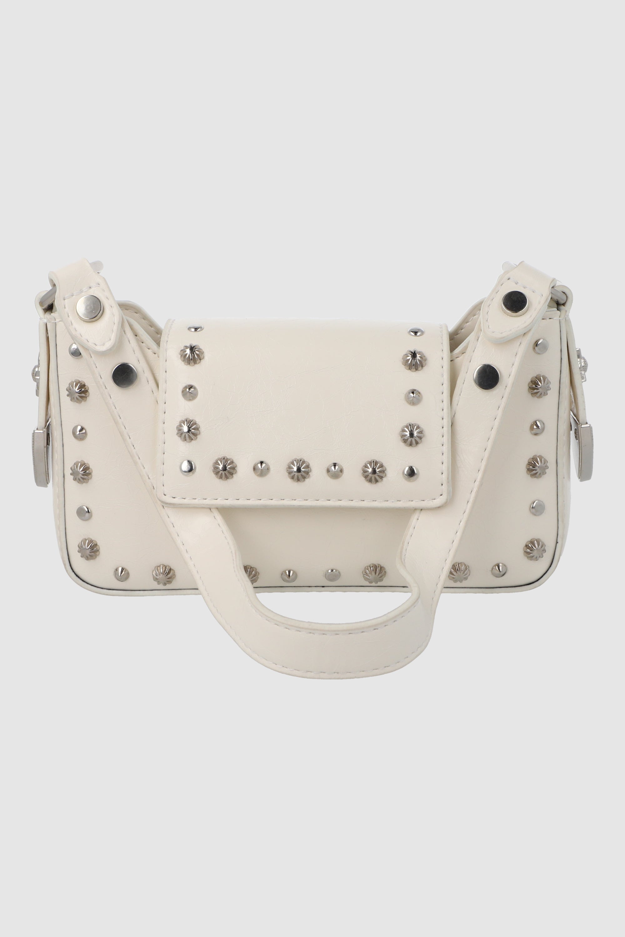 Bolsa crossbody studs sobre HUESO