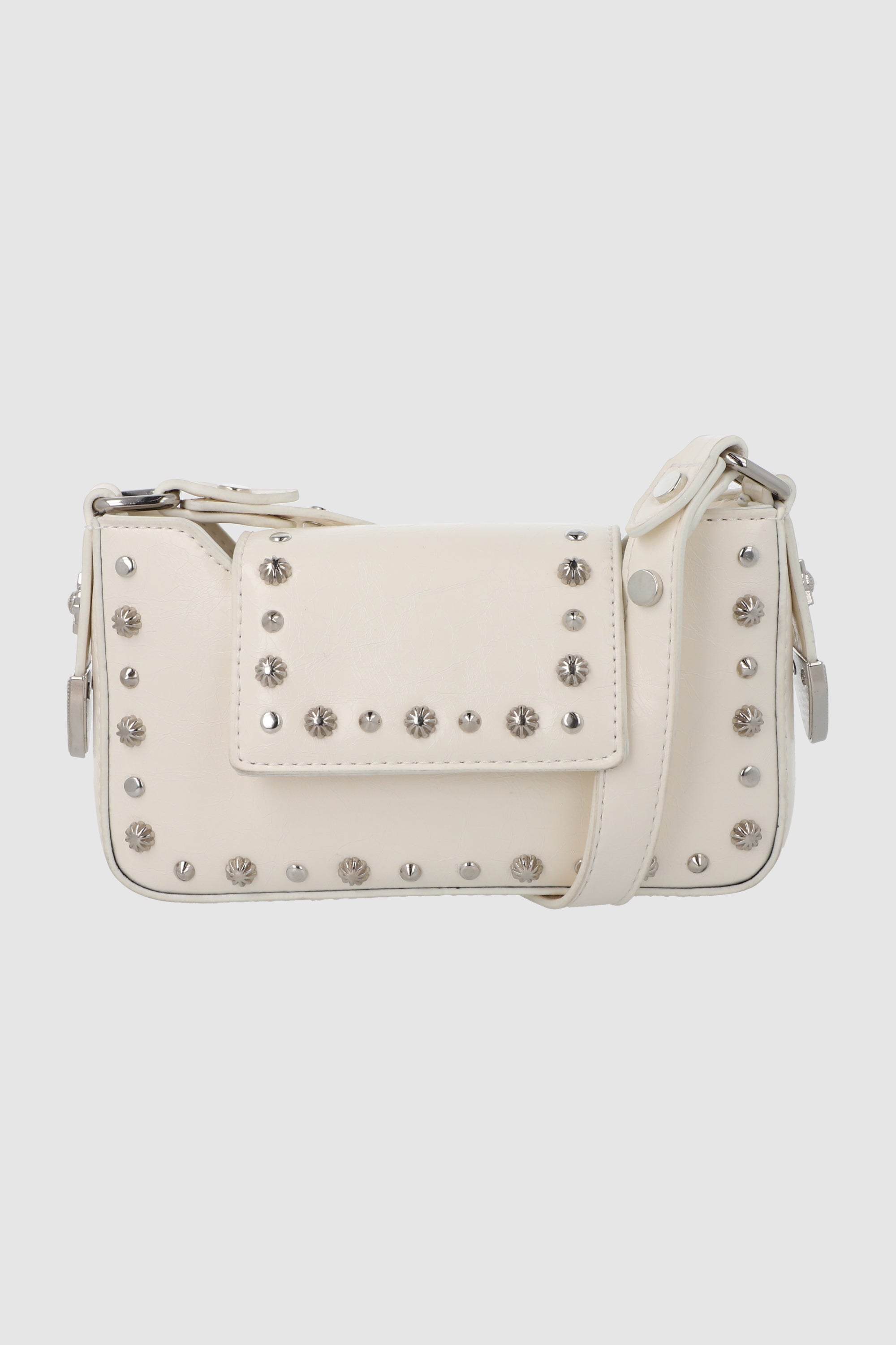 Bolsa crossbody studs sobre HUESO