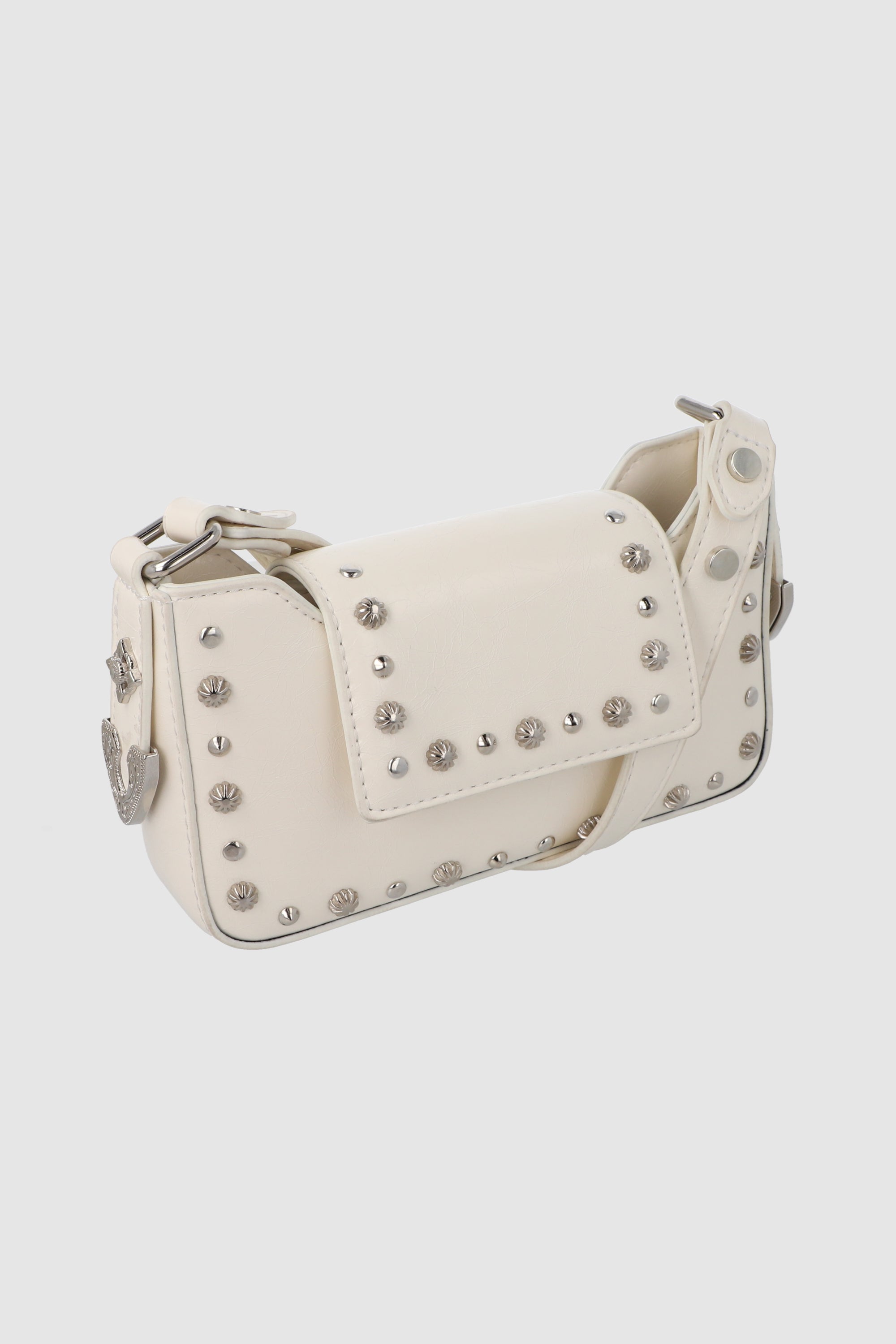 Bolsa crossbody studs sobre HUESO