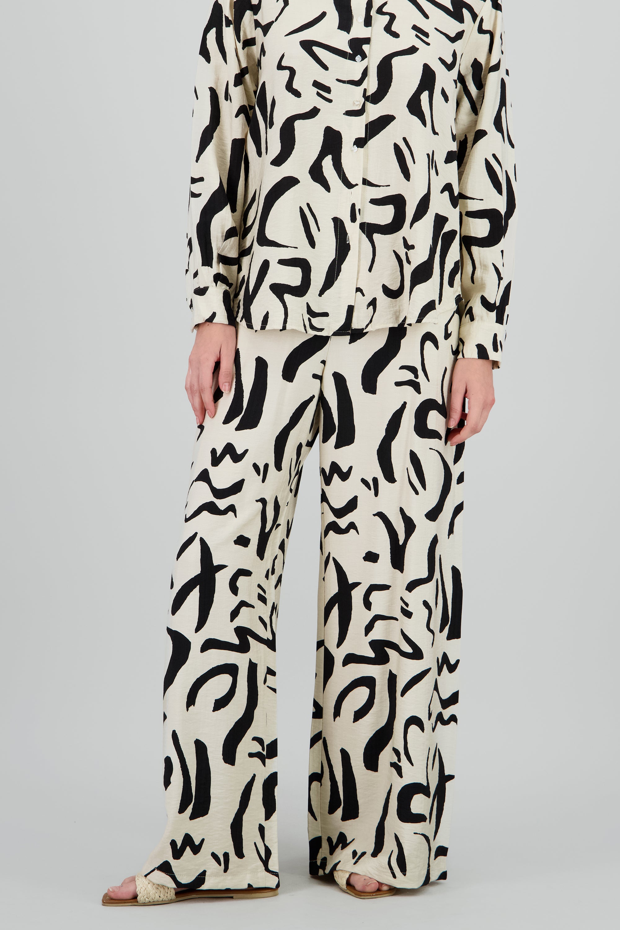 Pantalon amplio detalle resorte estampado BLANCO COMBO