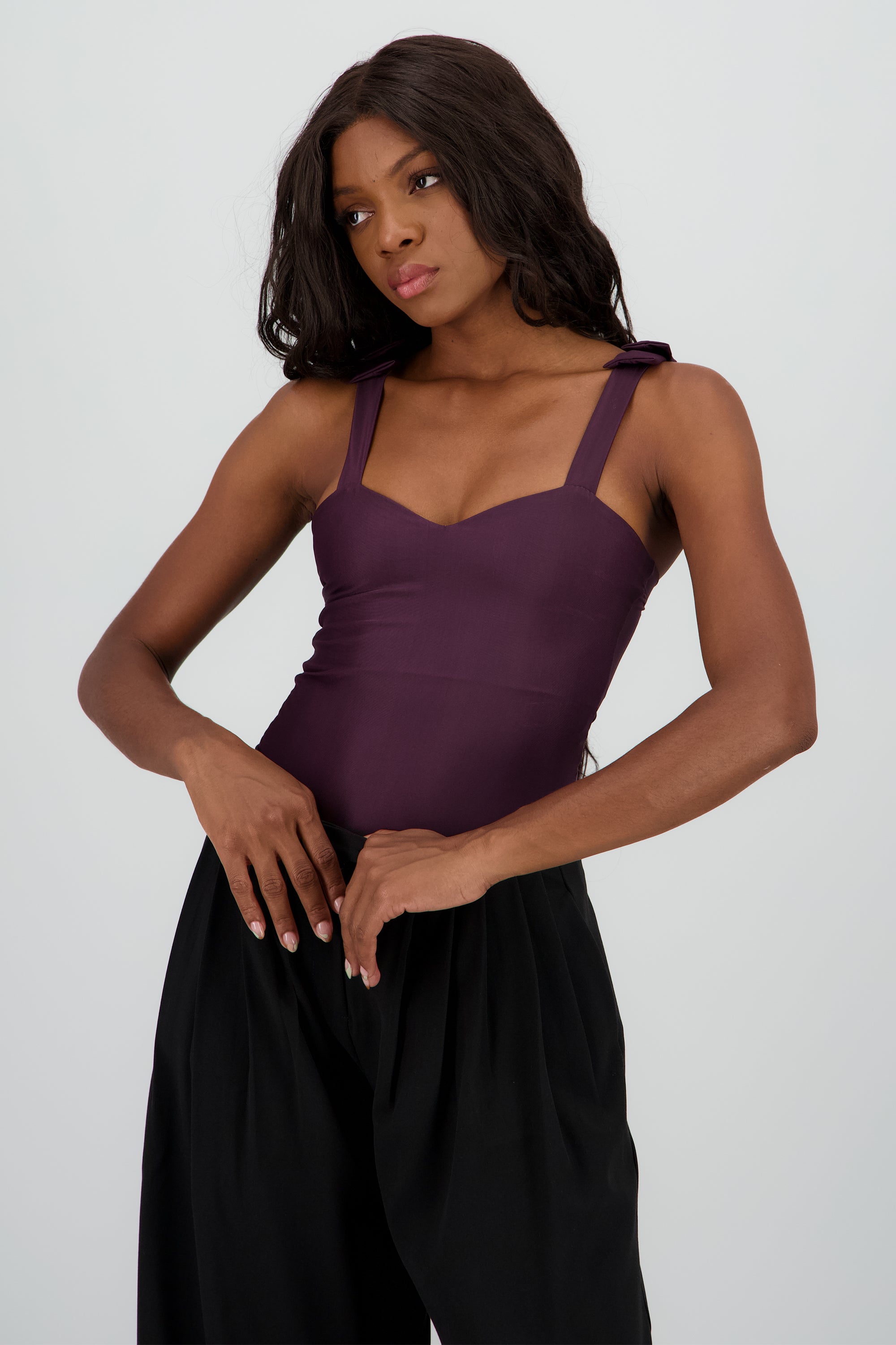 Bodysuit liso con tirante moños UVA