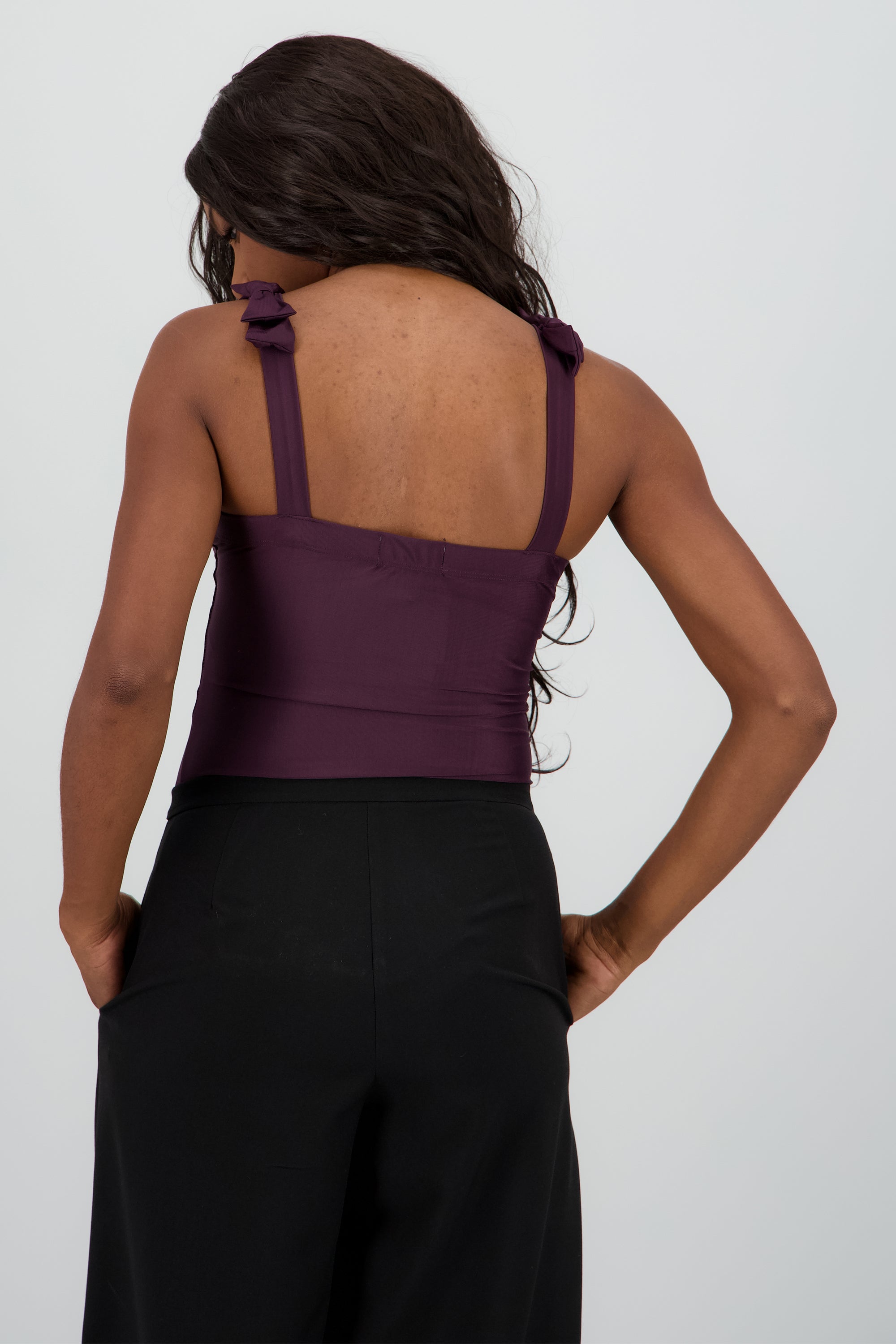 Bodysuit liso con tirante moños UVA