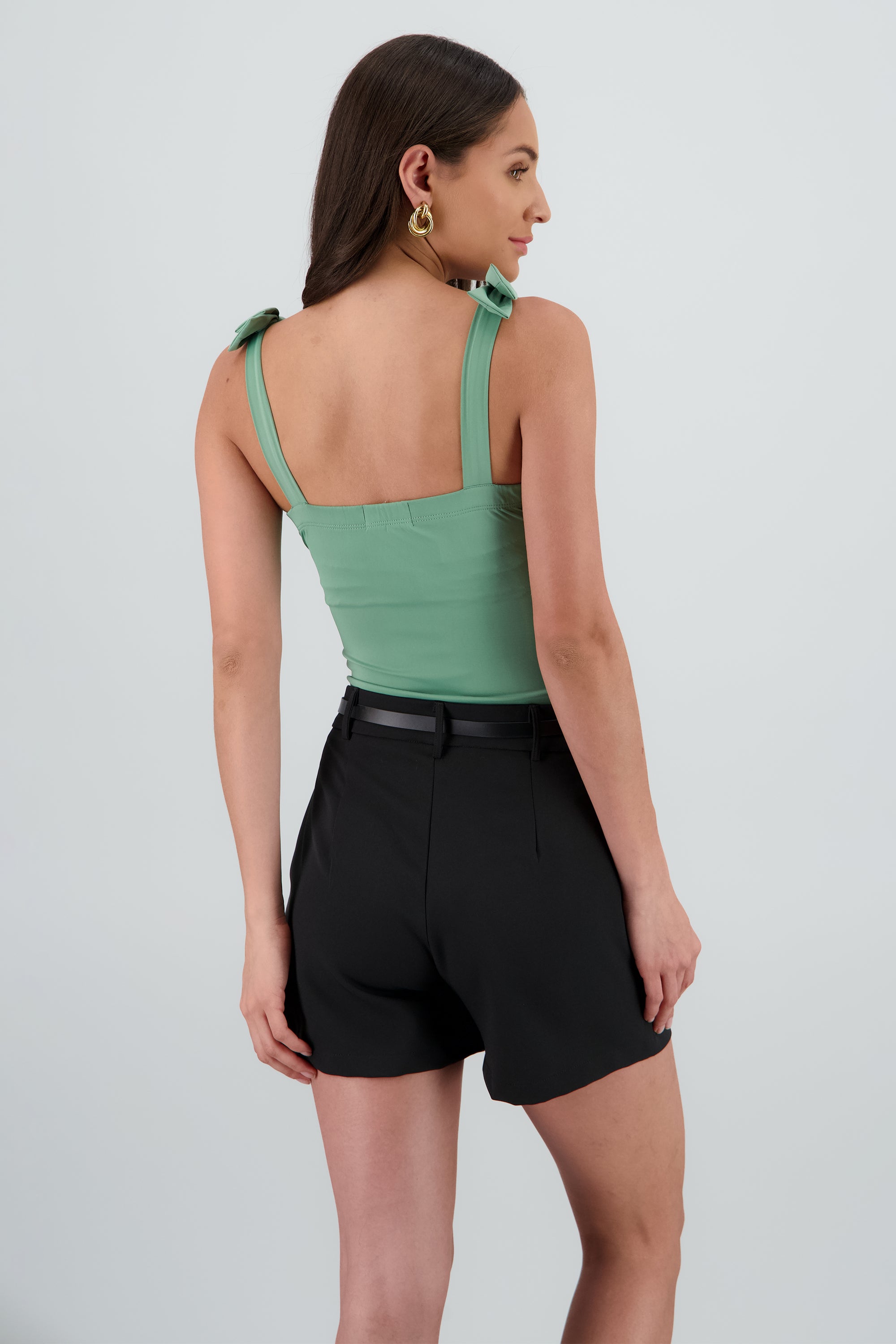 Bodysuit liso con tirante moños VERDE PASTO