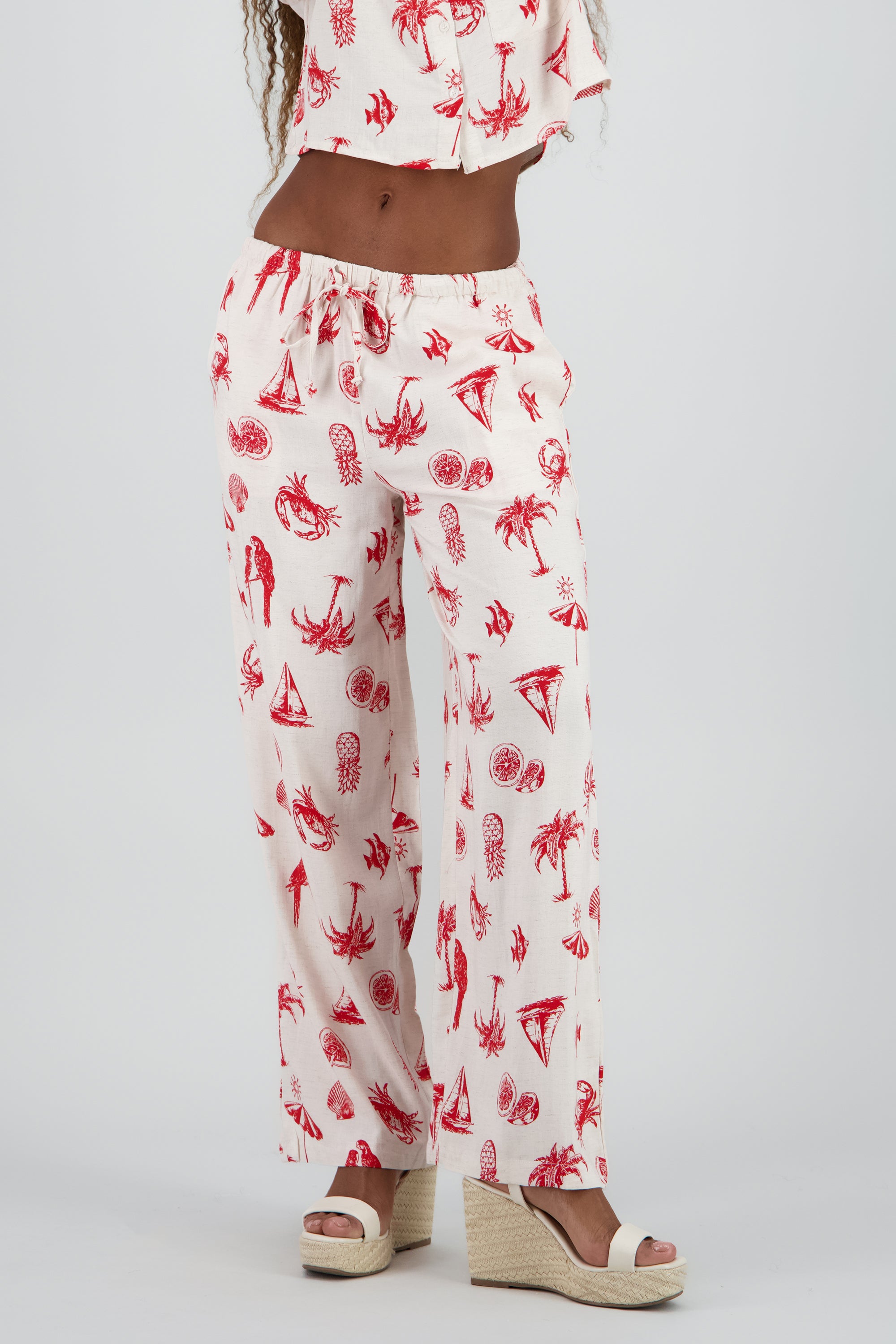 Pantalon tropical con mini print ROJO COMBO