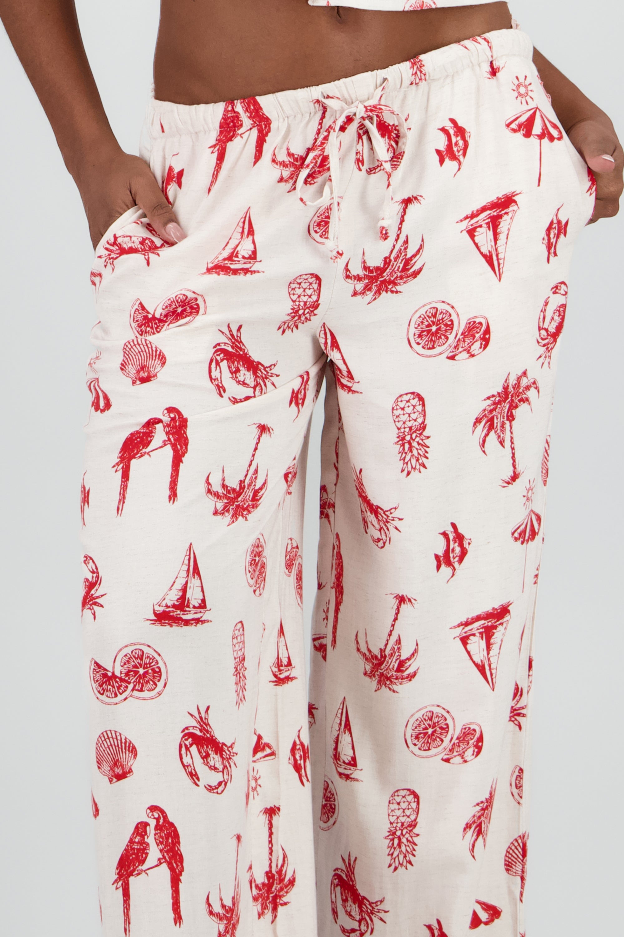 Pantalon tropical con mini print ROJO COMBO