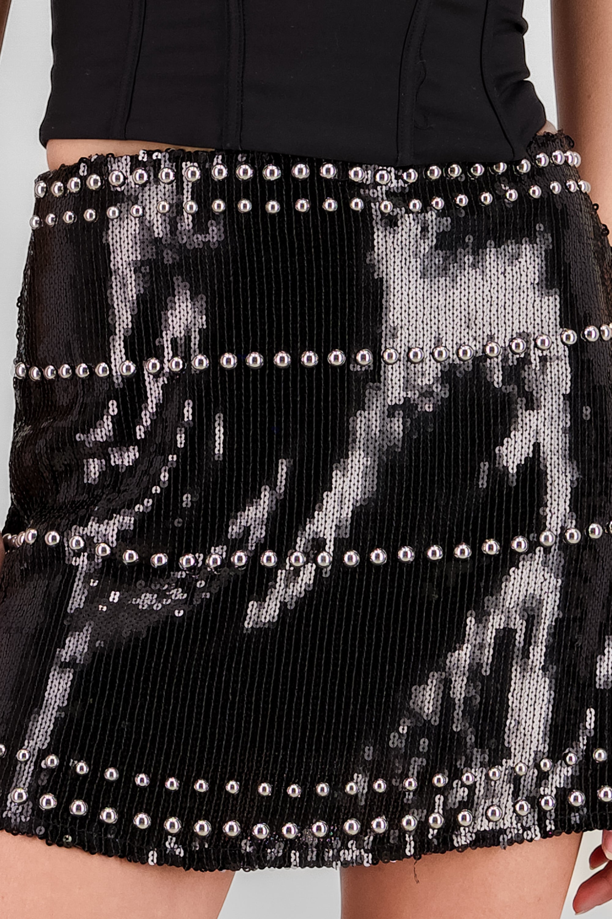 Falda mini lentejuela detalle aplicacion NEGRO
