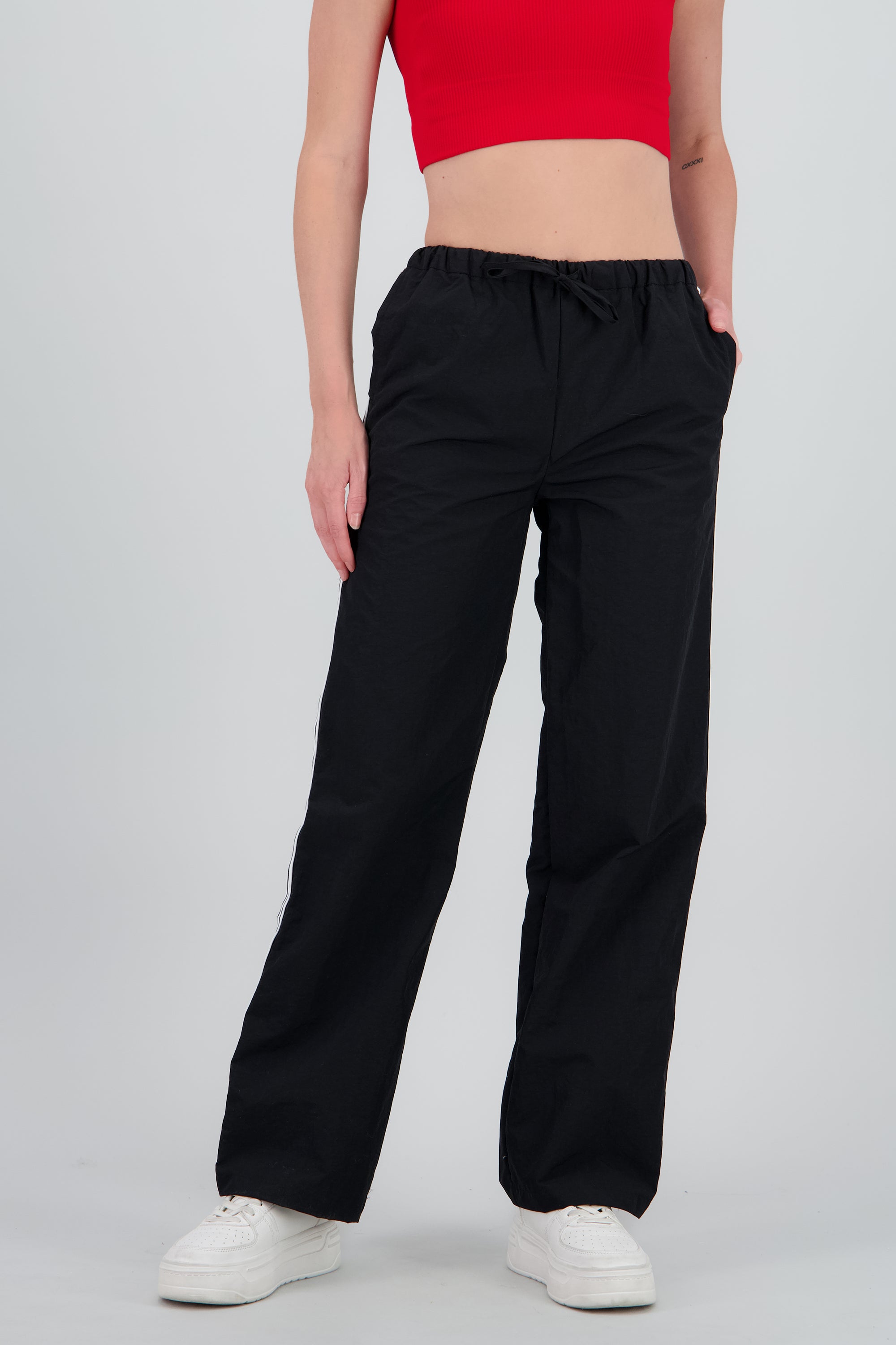 Pantalones lisos rayas nylon NEGRO