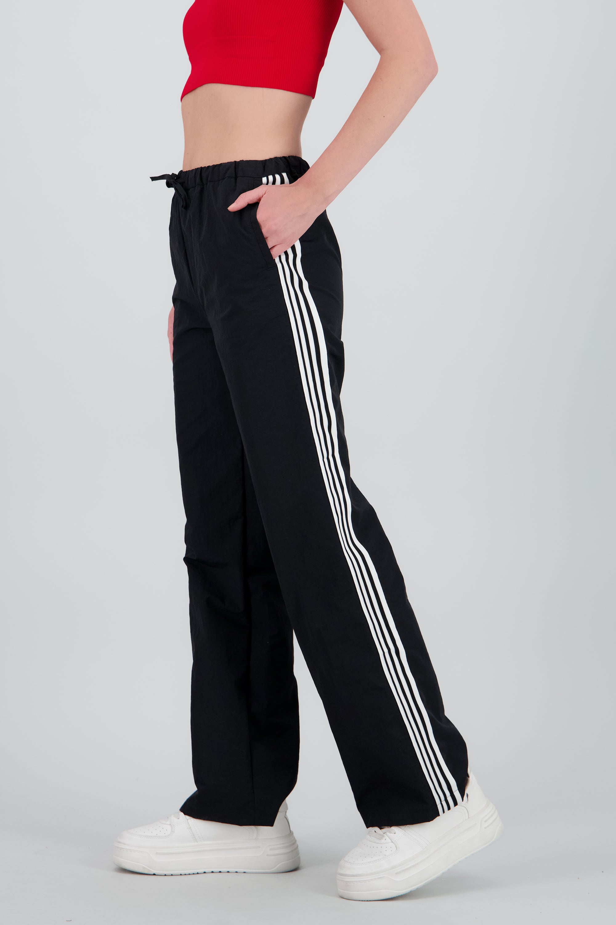 Pantalones lisos rayas nylon NEGRO