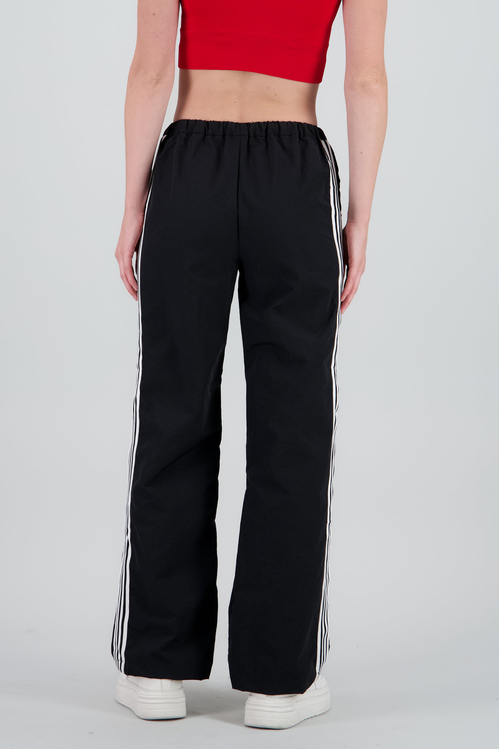 Pantalones lisos rayas nylon NEGRO