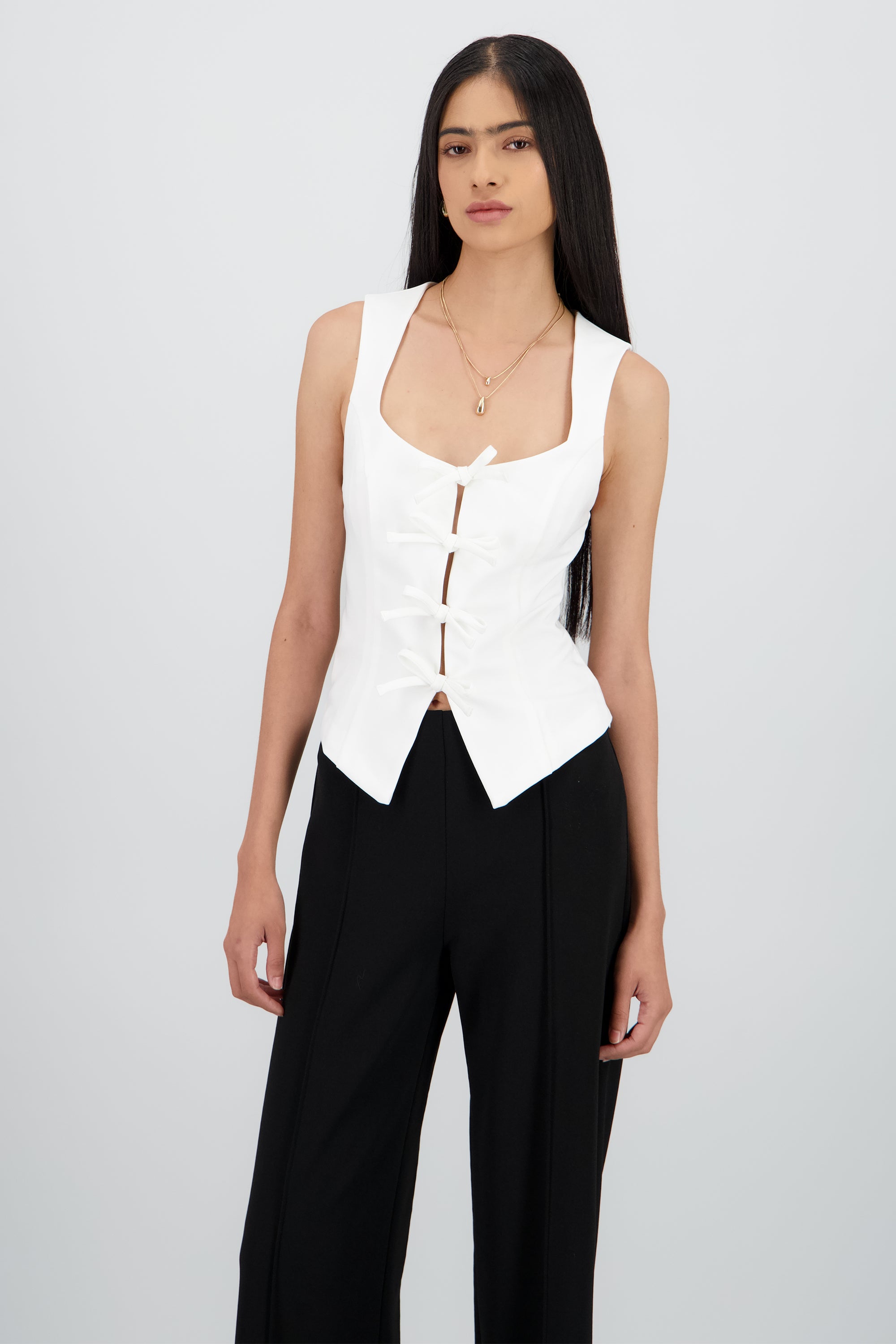Blusa sin mangas con moños BLANCO
