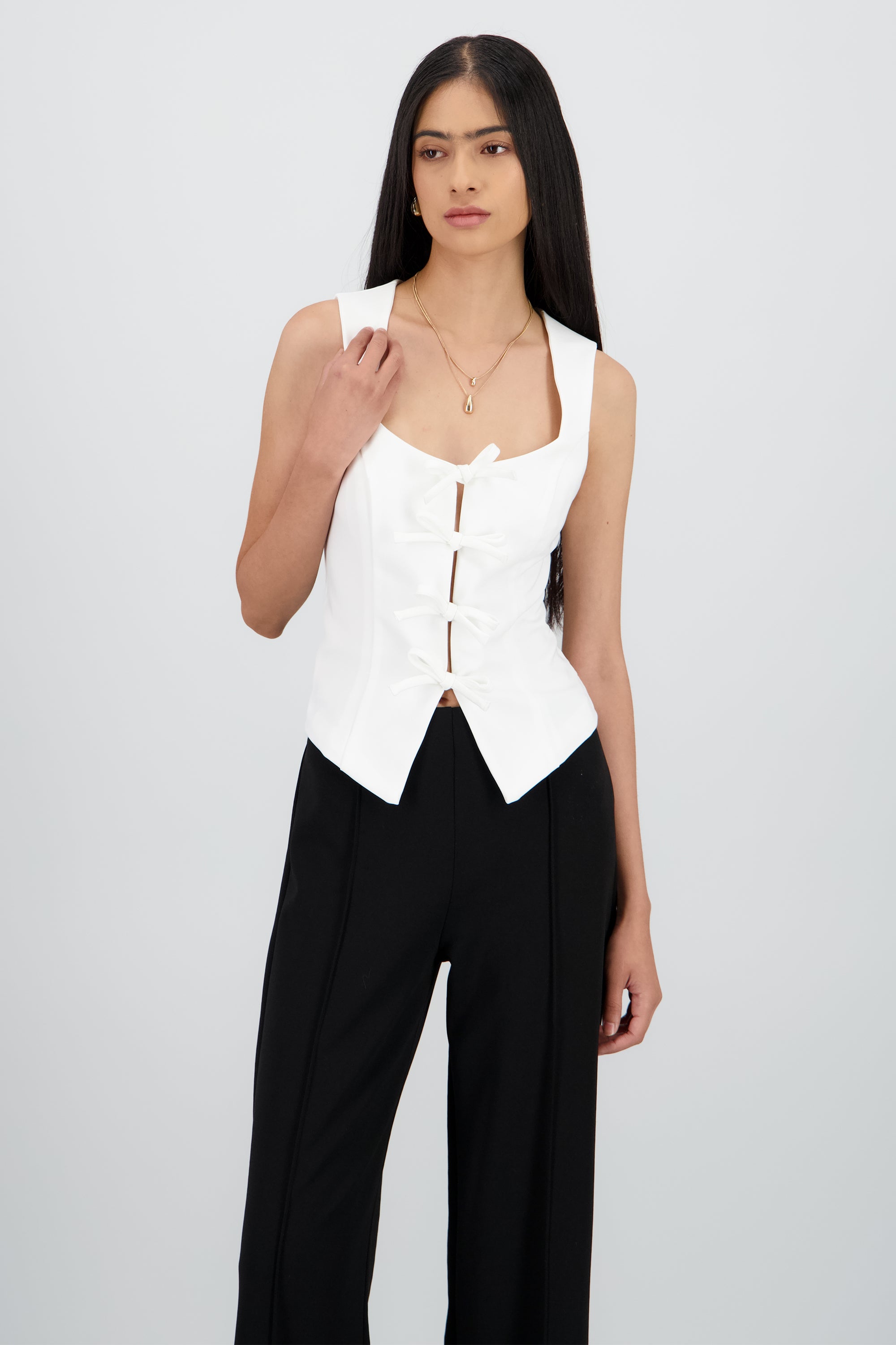Blusa sin mangas con moños BLANCO