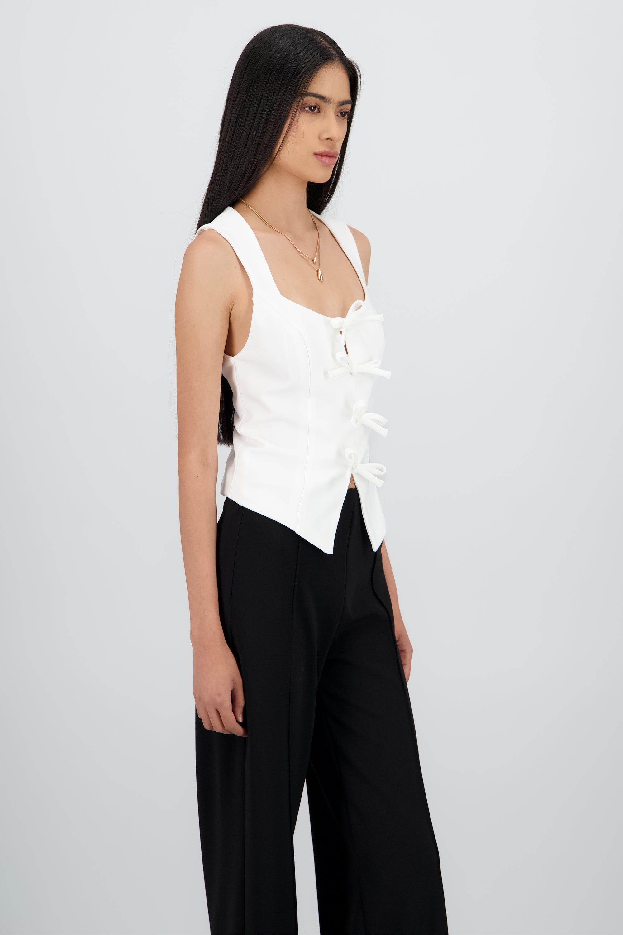 Blusa sin mangas con moños BLANCO