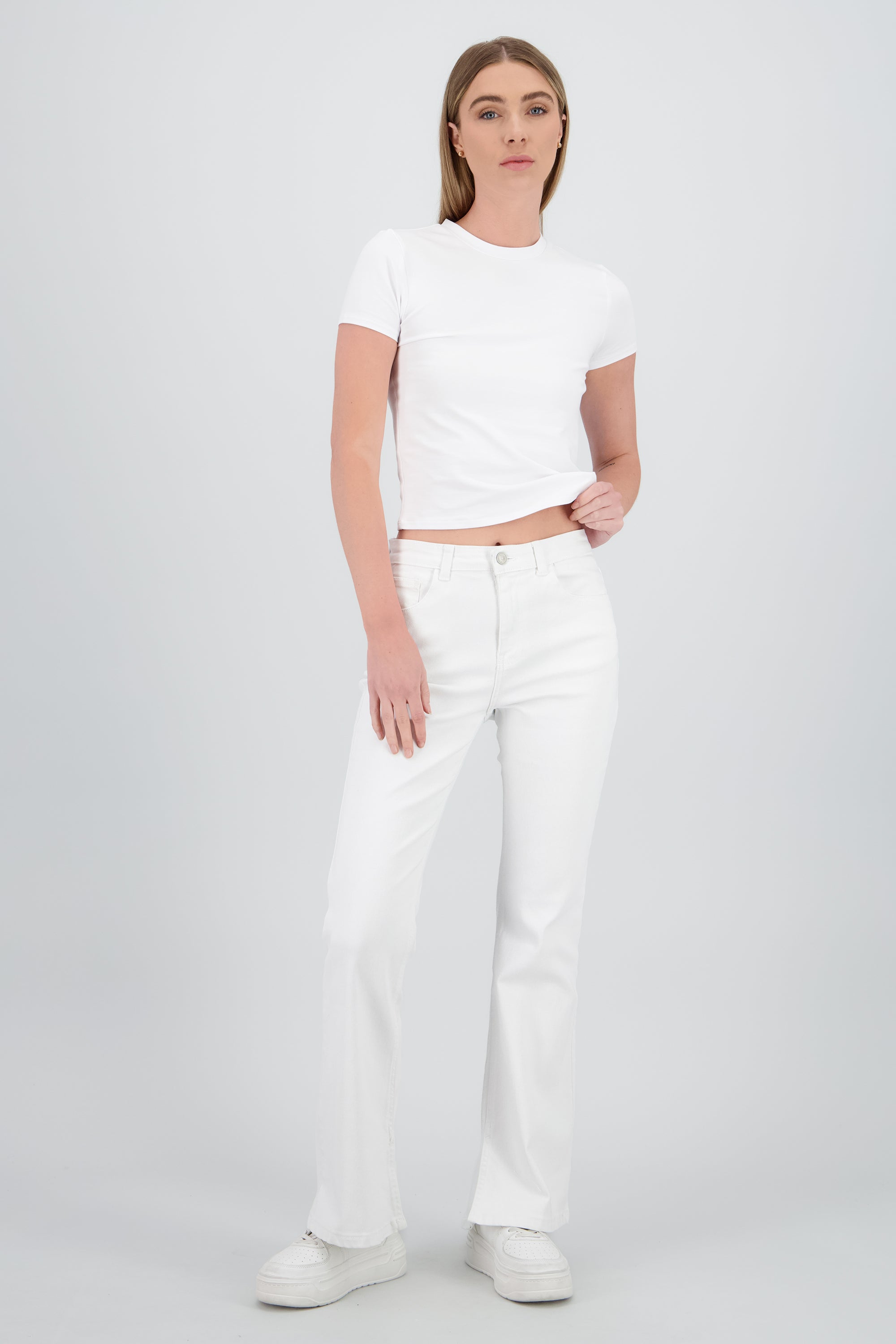 Jeans flare con abertura HUESO