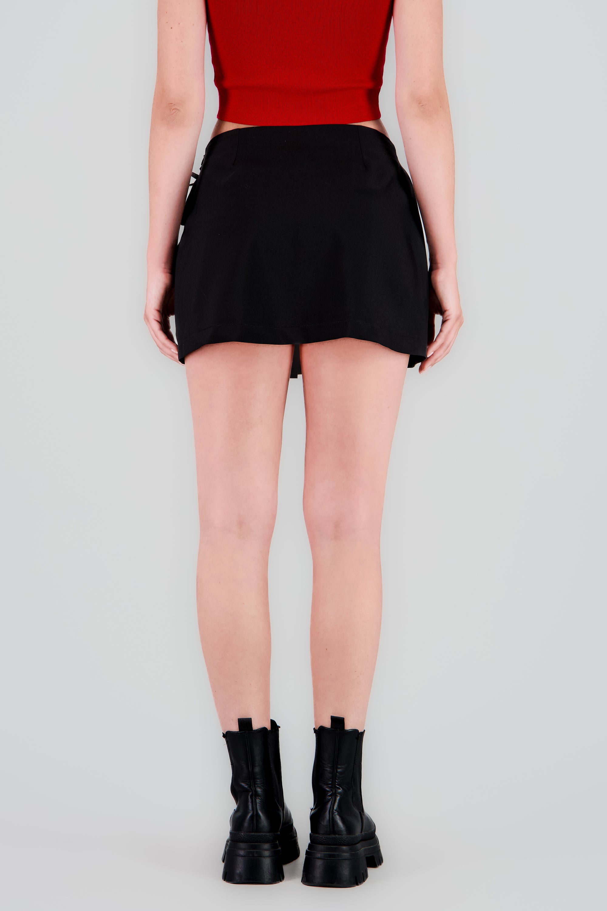 Falda mini tableada detalle moños NEGRO