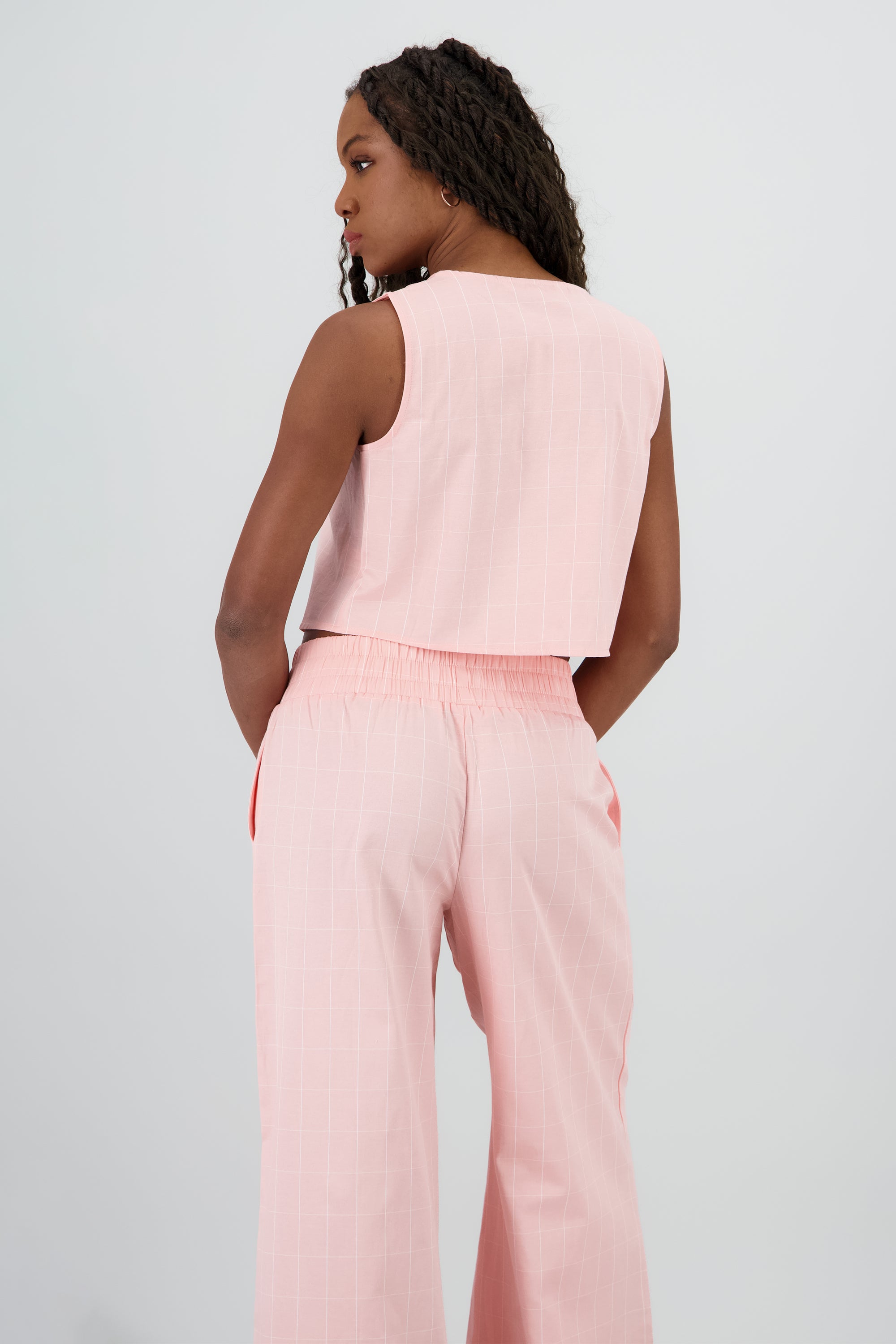 Chaleco cuello v detalle moños ROSA
