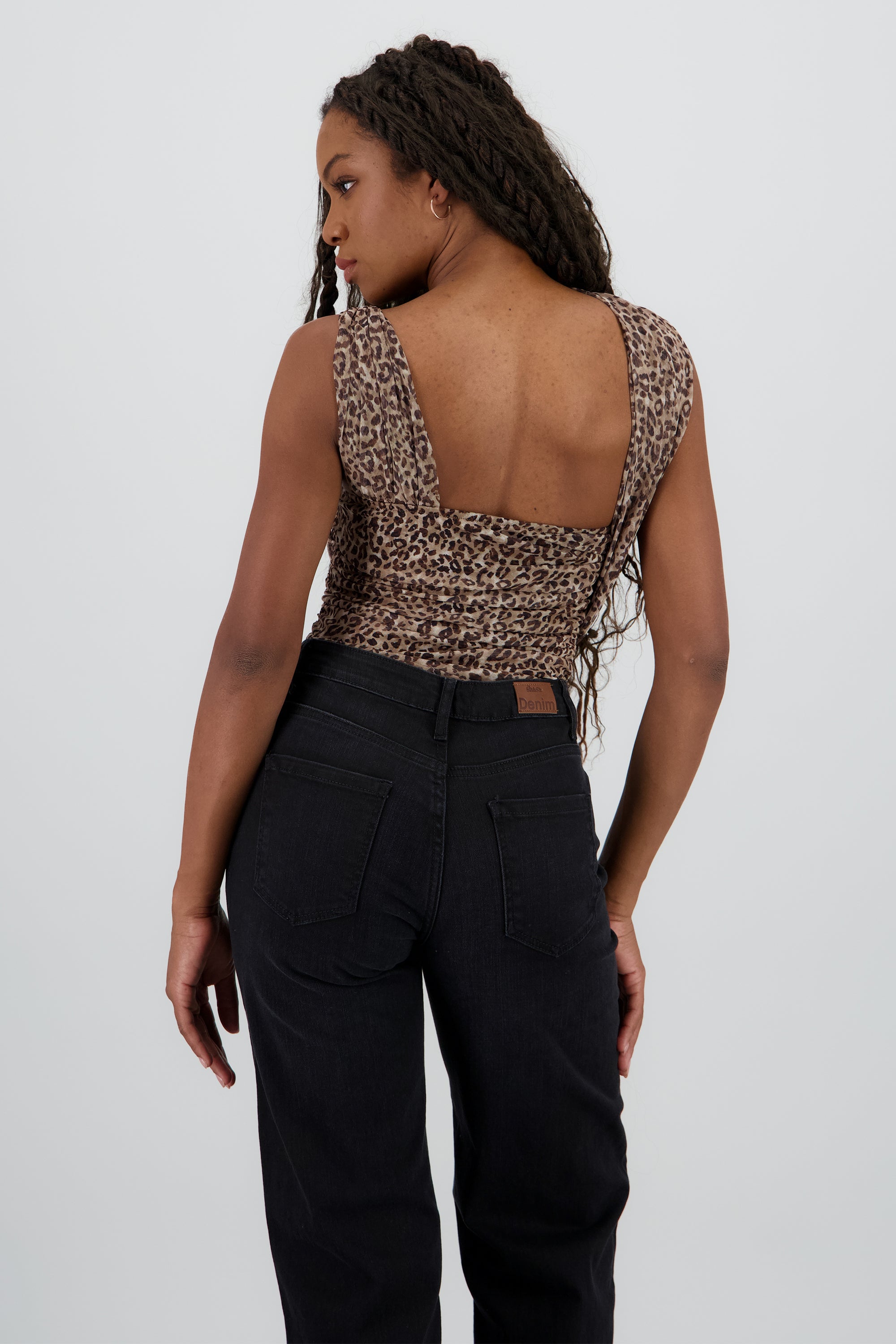 Bodysuit sin manga asimétrico animal print CAFE COMBO