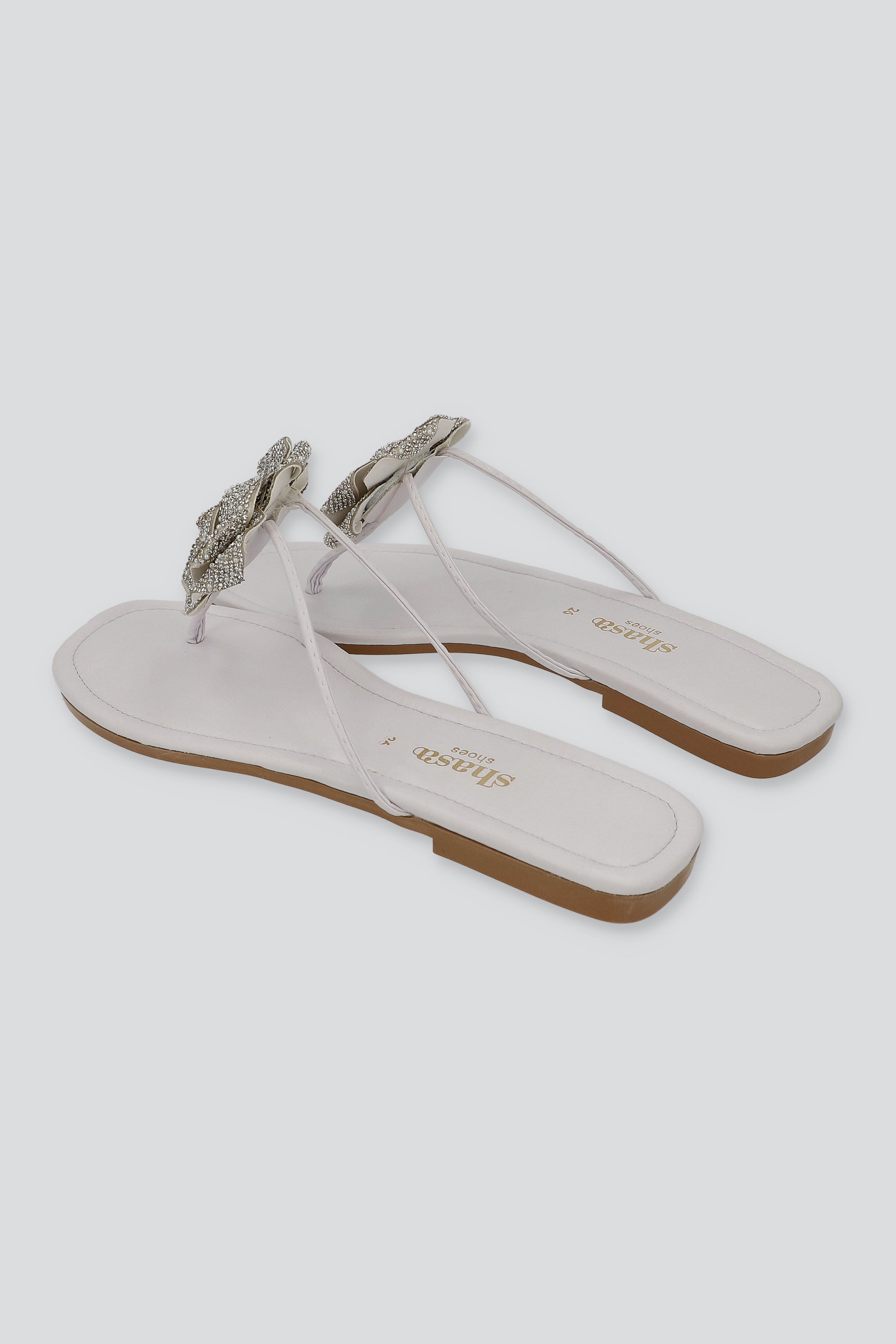 Sandala pata de gallo brillos flor BLANCO