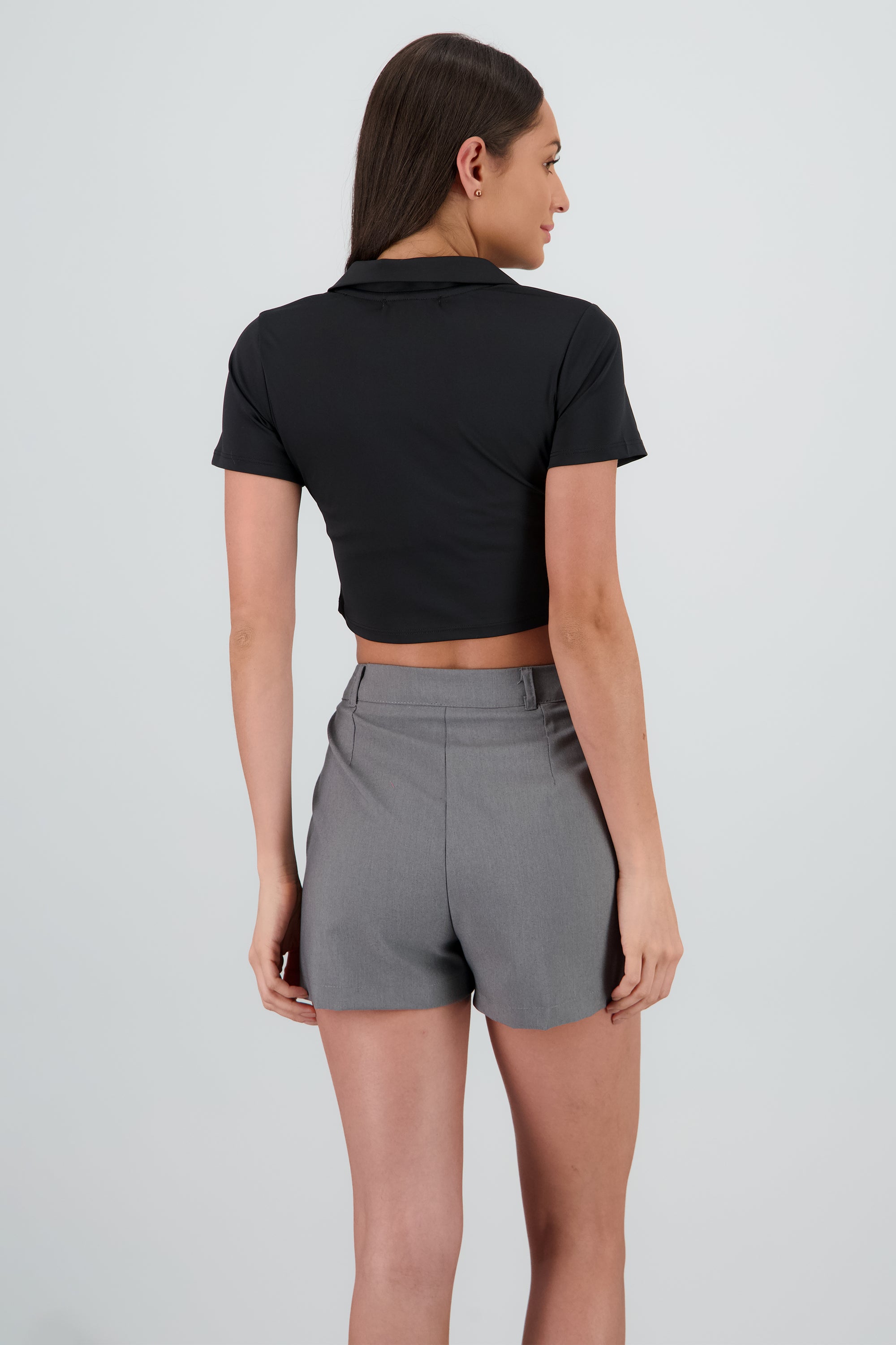 Top manga corta detalle cuello polo NEGRO