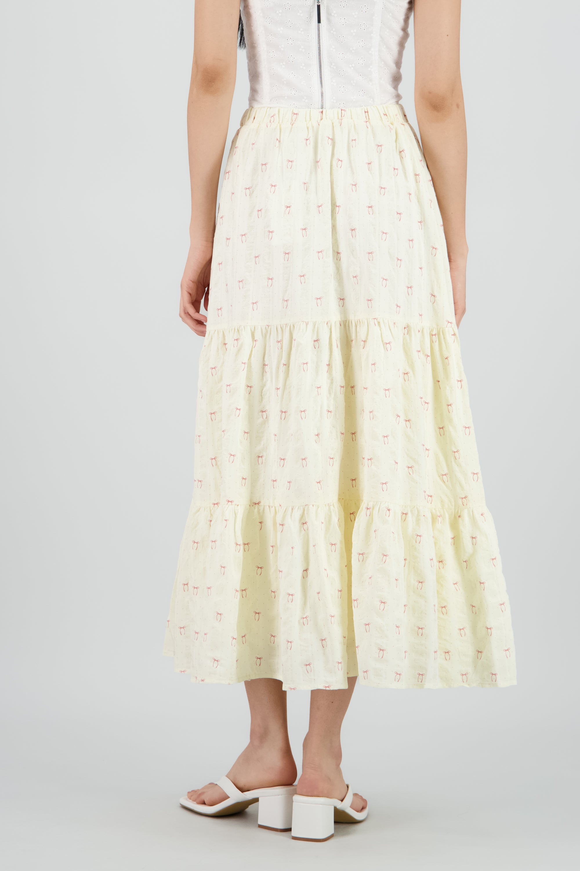 Falda midi estampado moños y polkas CREMA