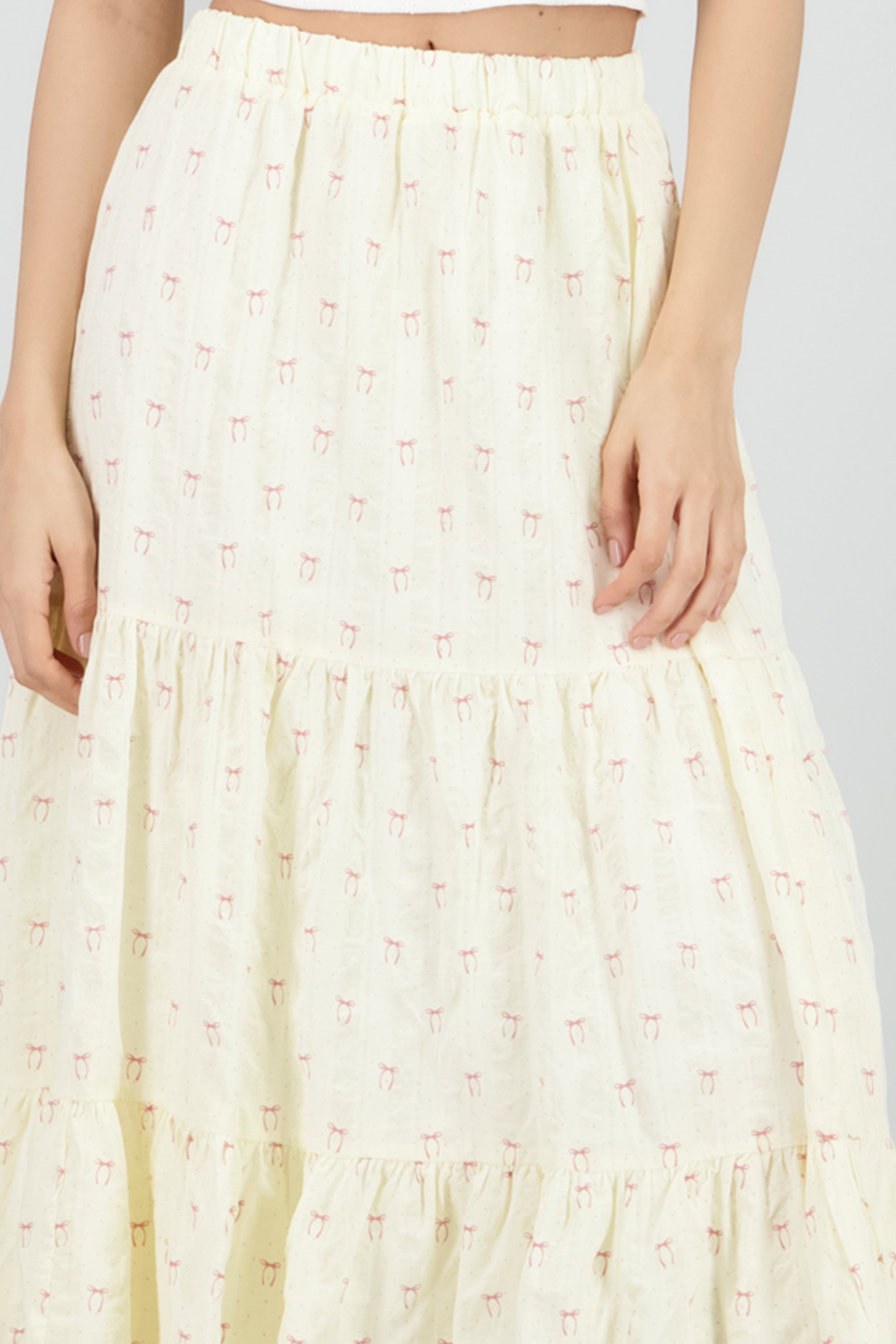 Falda midi estampado moños y polkas CREMA