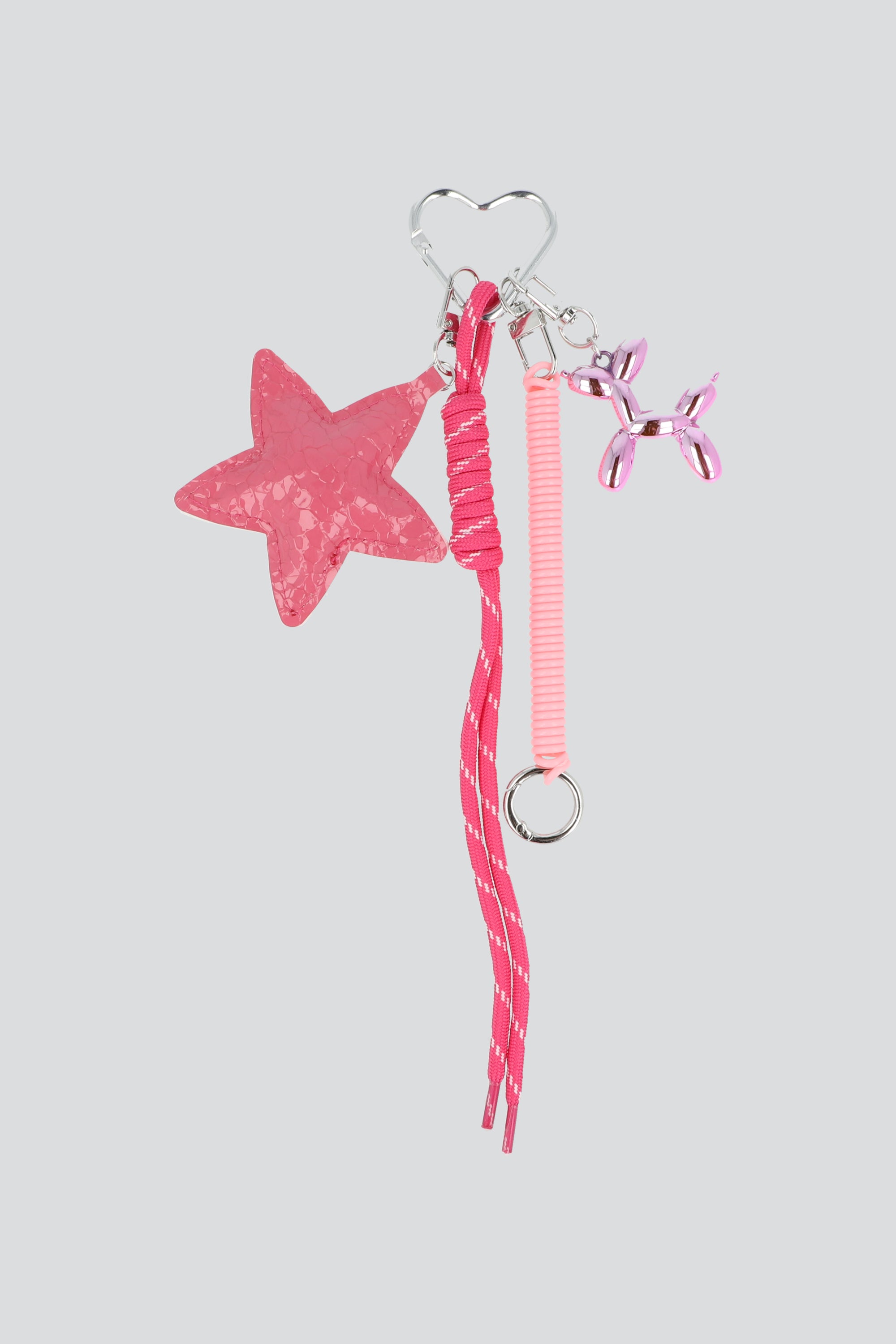 LLAVERO PERRO ESTRELLA METALICA ROSA