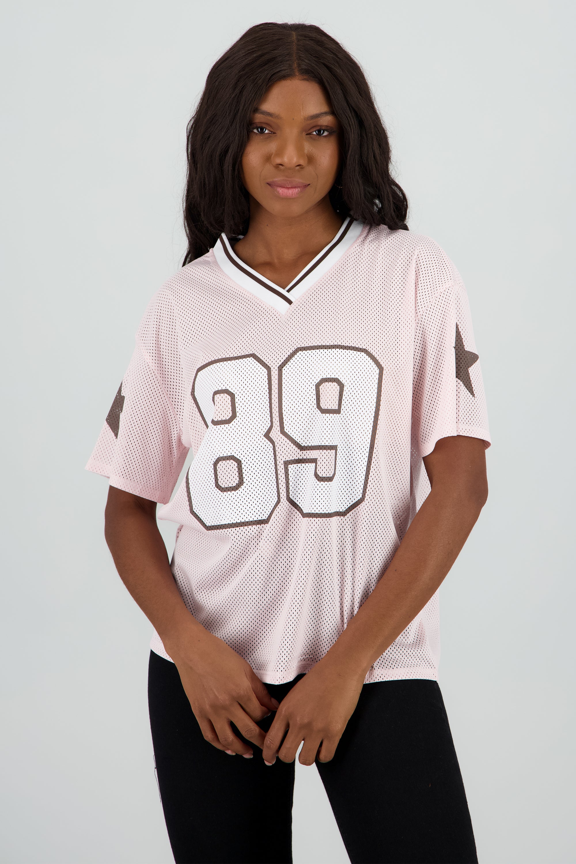 Playera oversize numero estrellas ny ROSA PASTEL