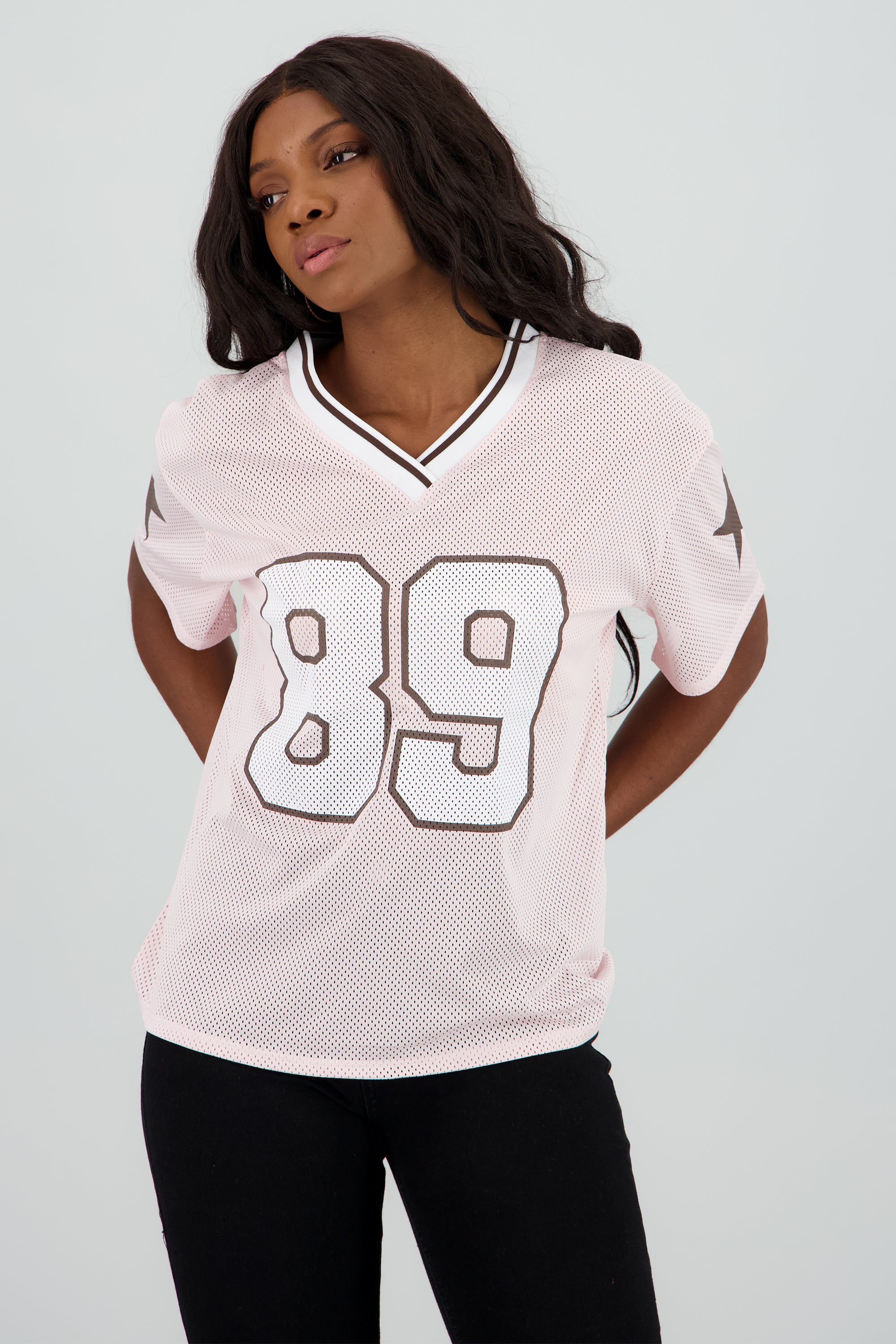 Playera oversize numero estrellas ny ROSA PASTEL
