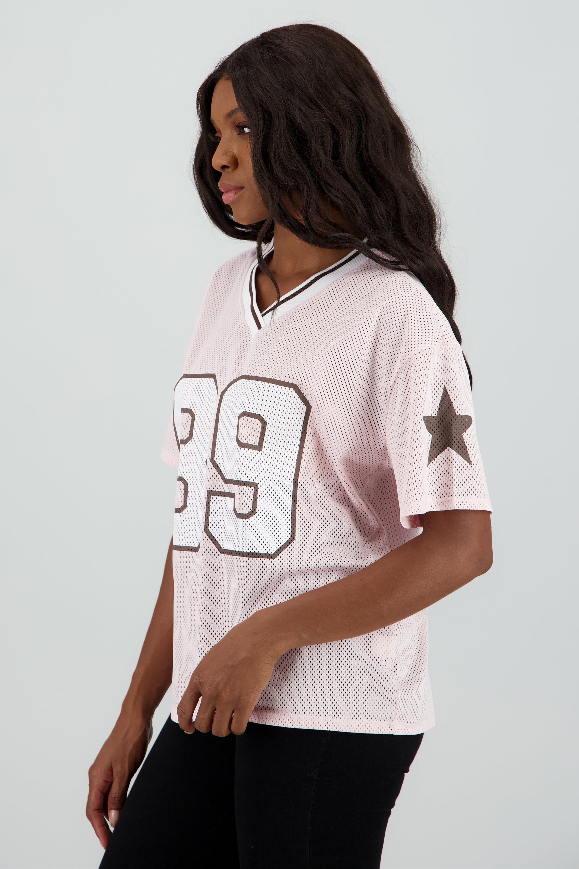 Playera oversize numero estrellas ny ROSA PASTEL