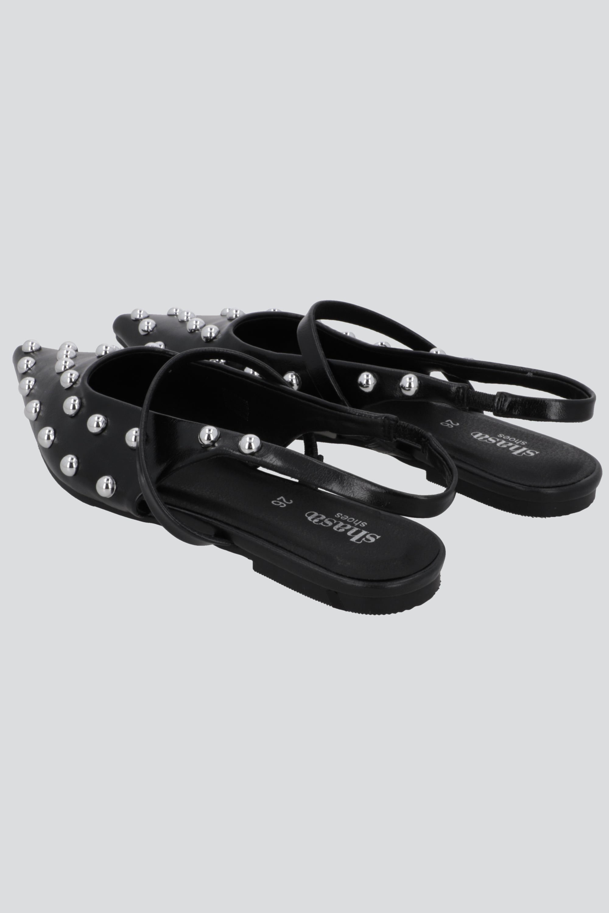 Flat pointy studs redondos NEGRO
