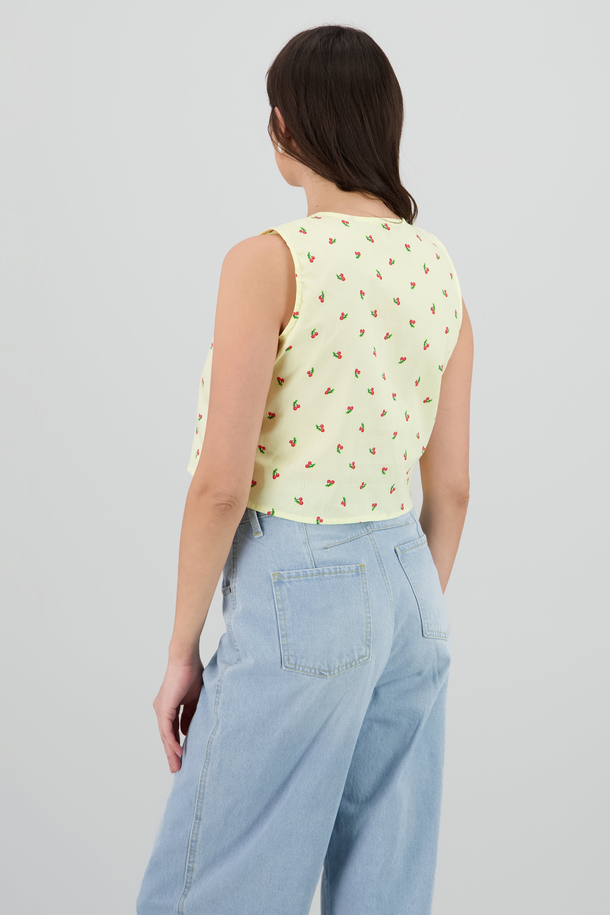Blusa sin manga detalle lazos cerezas AMARILLO PASTEL