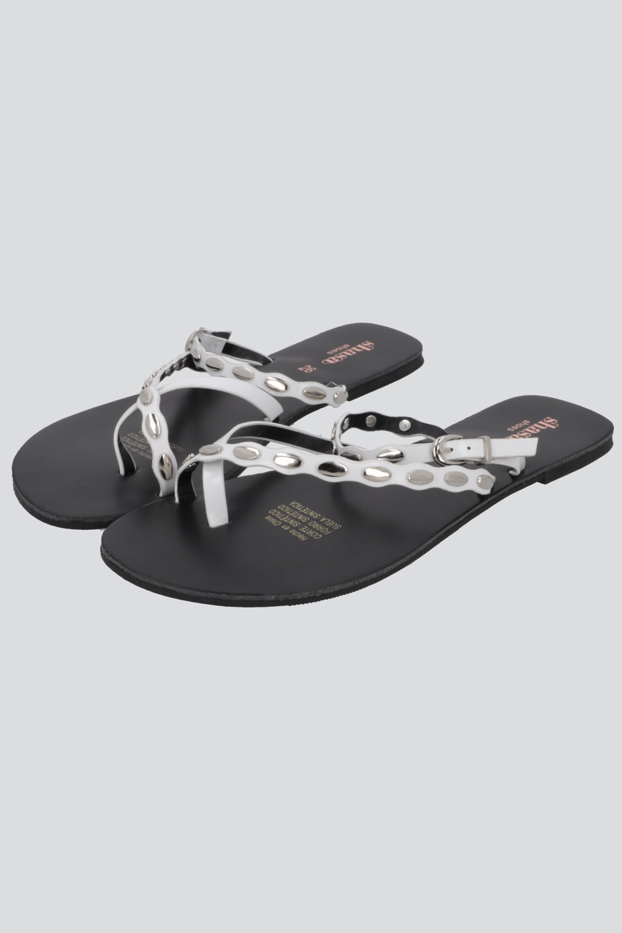 Sandalia conchitas diagonal HUESO