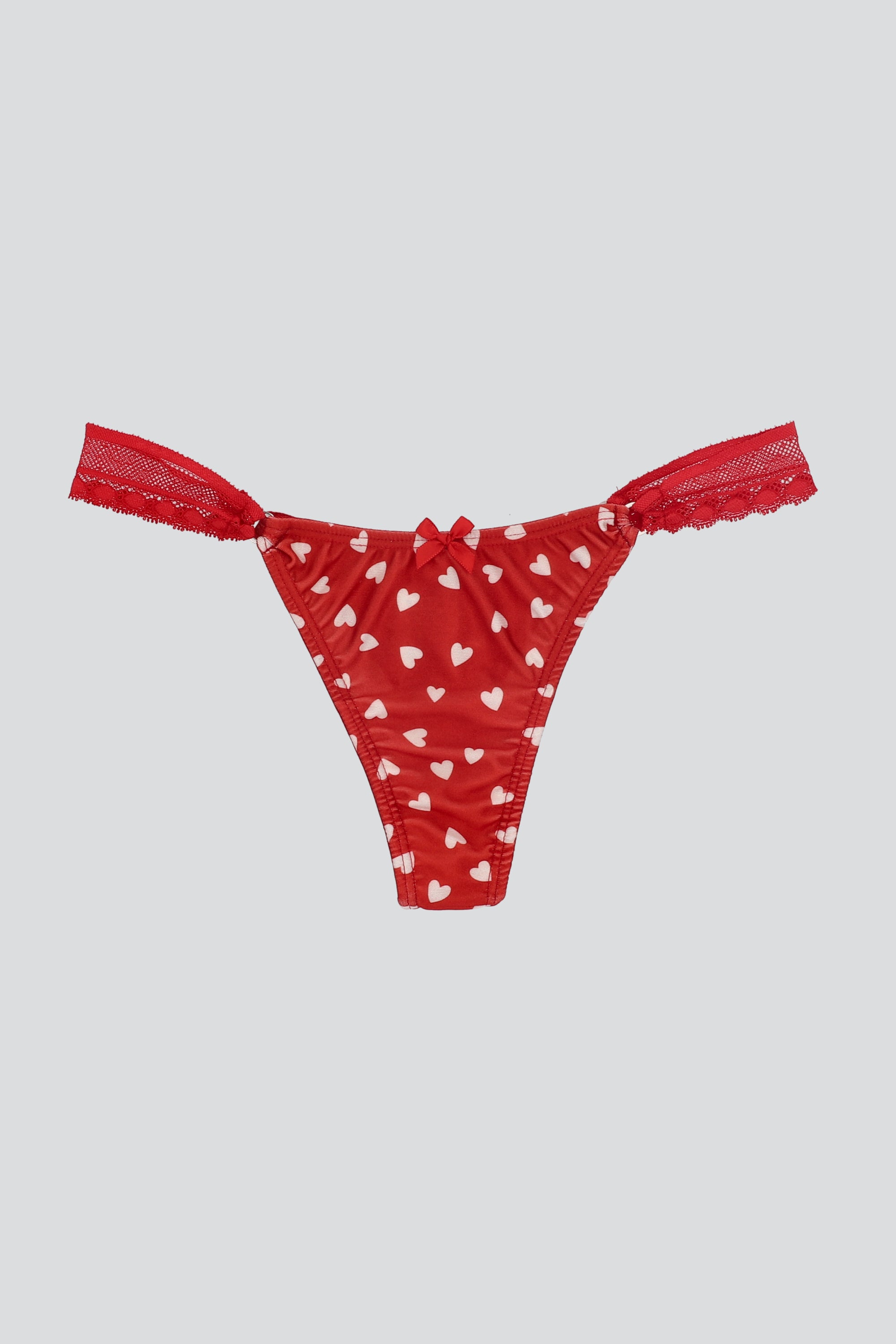 Tanga detalle lateral estampado formas ROJO