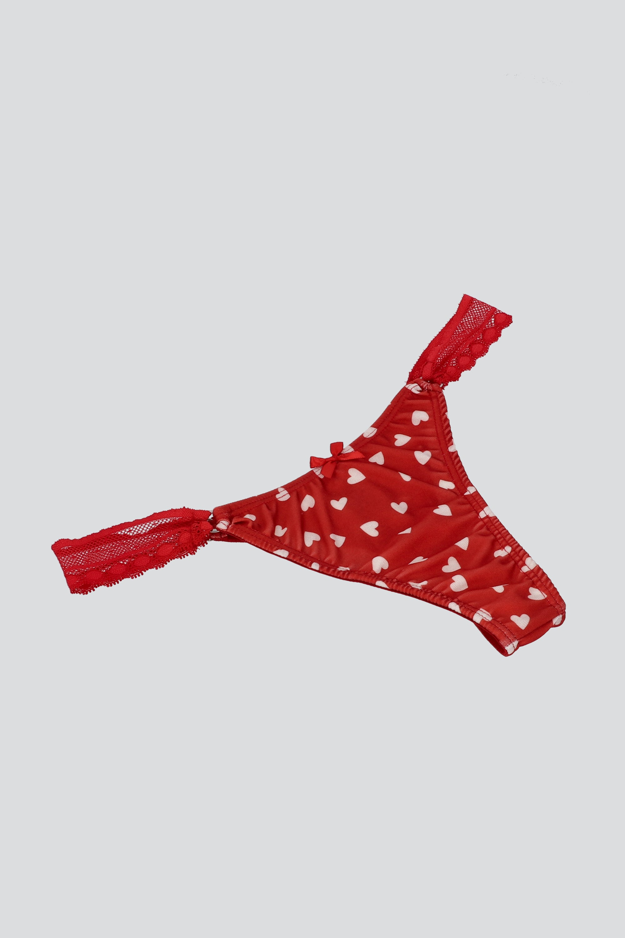 Tanga detalle lateral estampado formas ROJO