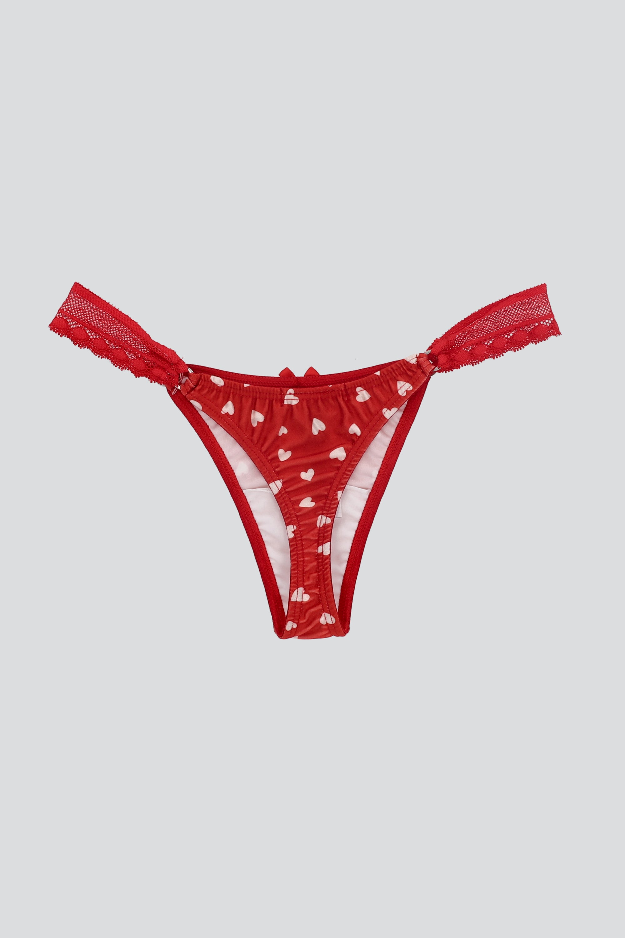 Tanga detalle lateral estampado formas ROJO