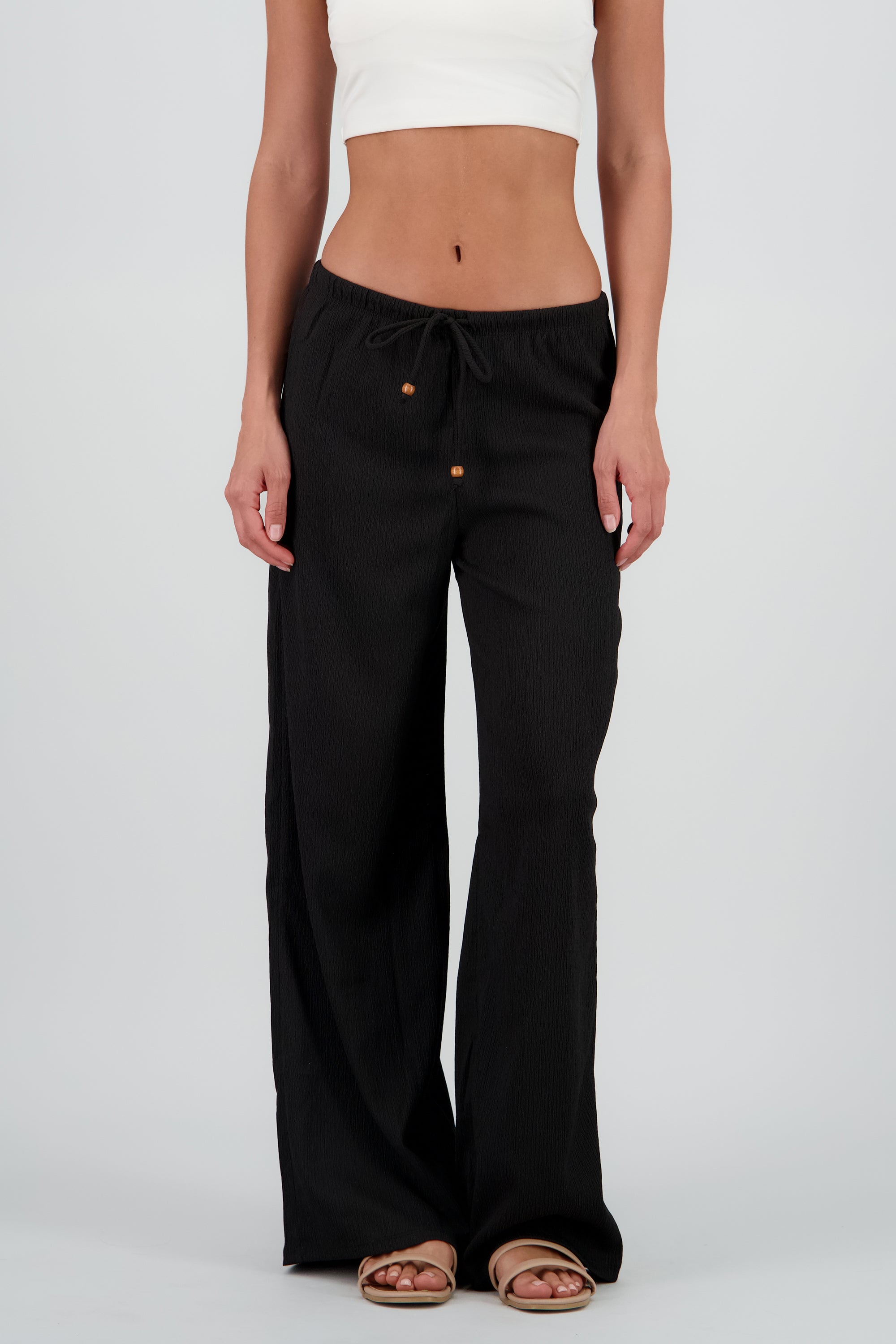 Pantalon amplio jaretas detalle cuentas NEGRO