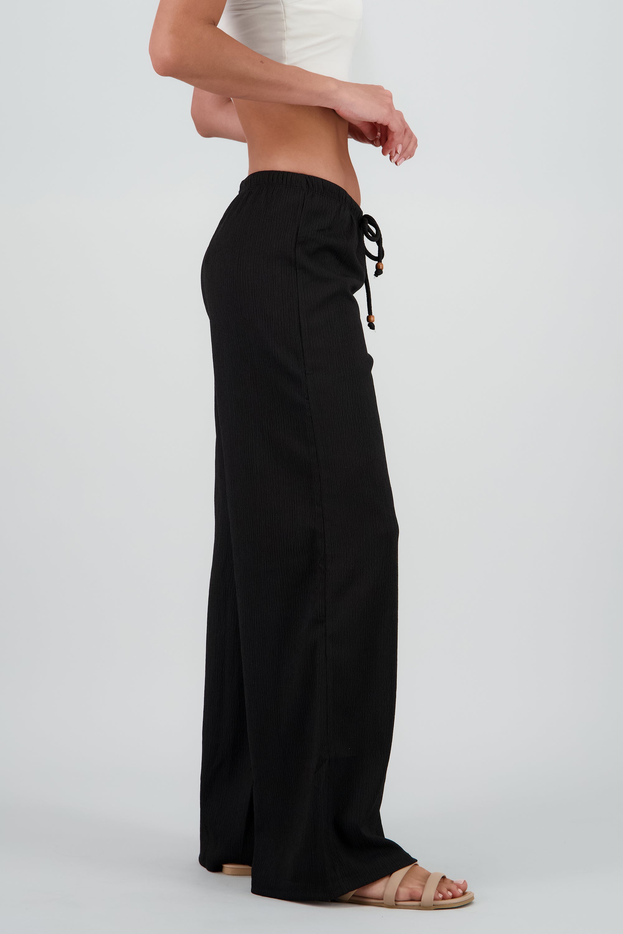 Pantalon amplio jaretas detalle cuentas NEGRO