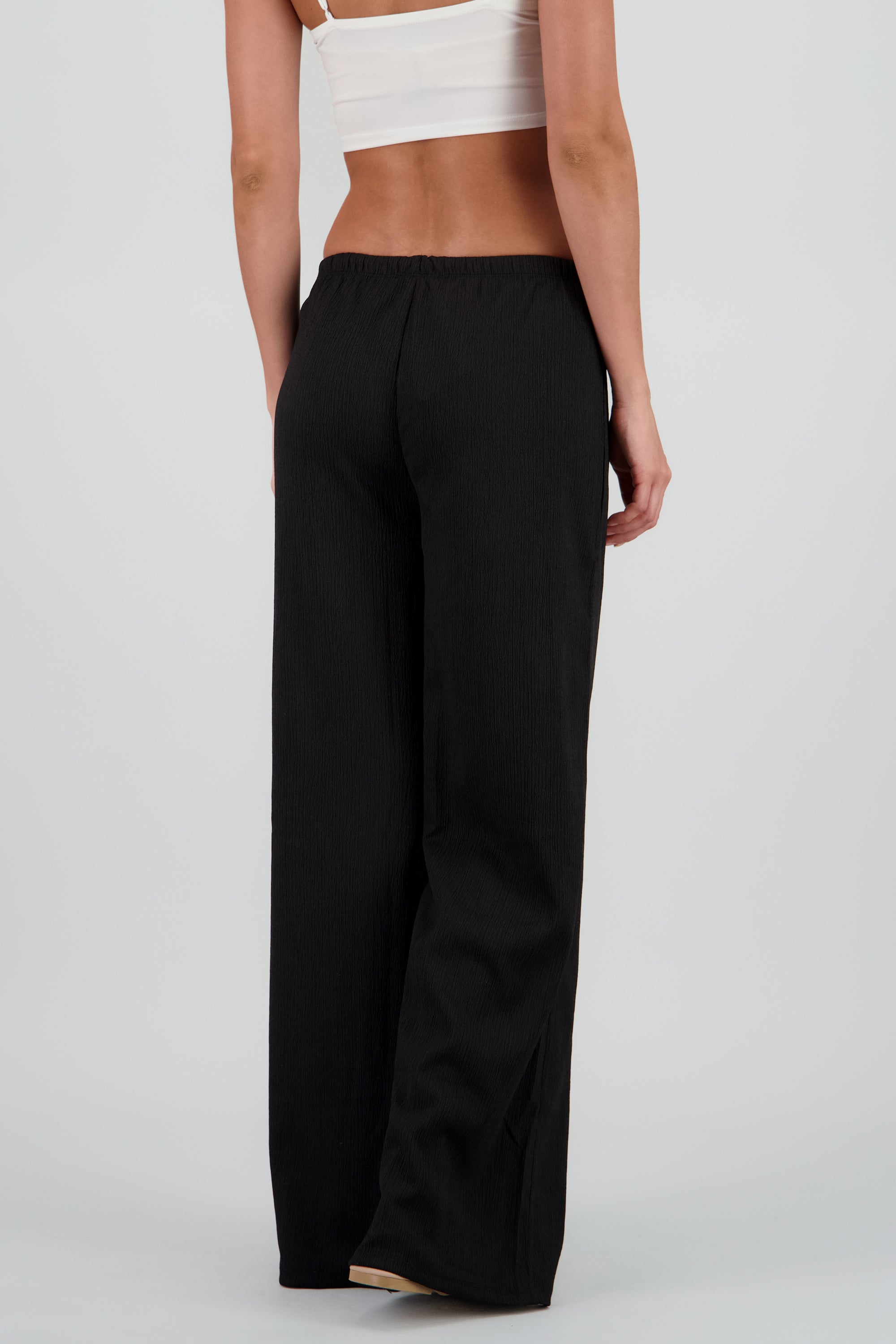 Pantalon amplio jaretas detalle cuentas NEGRO