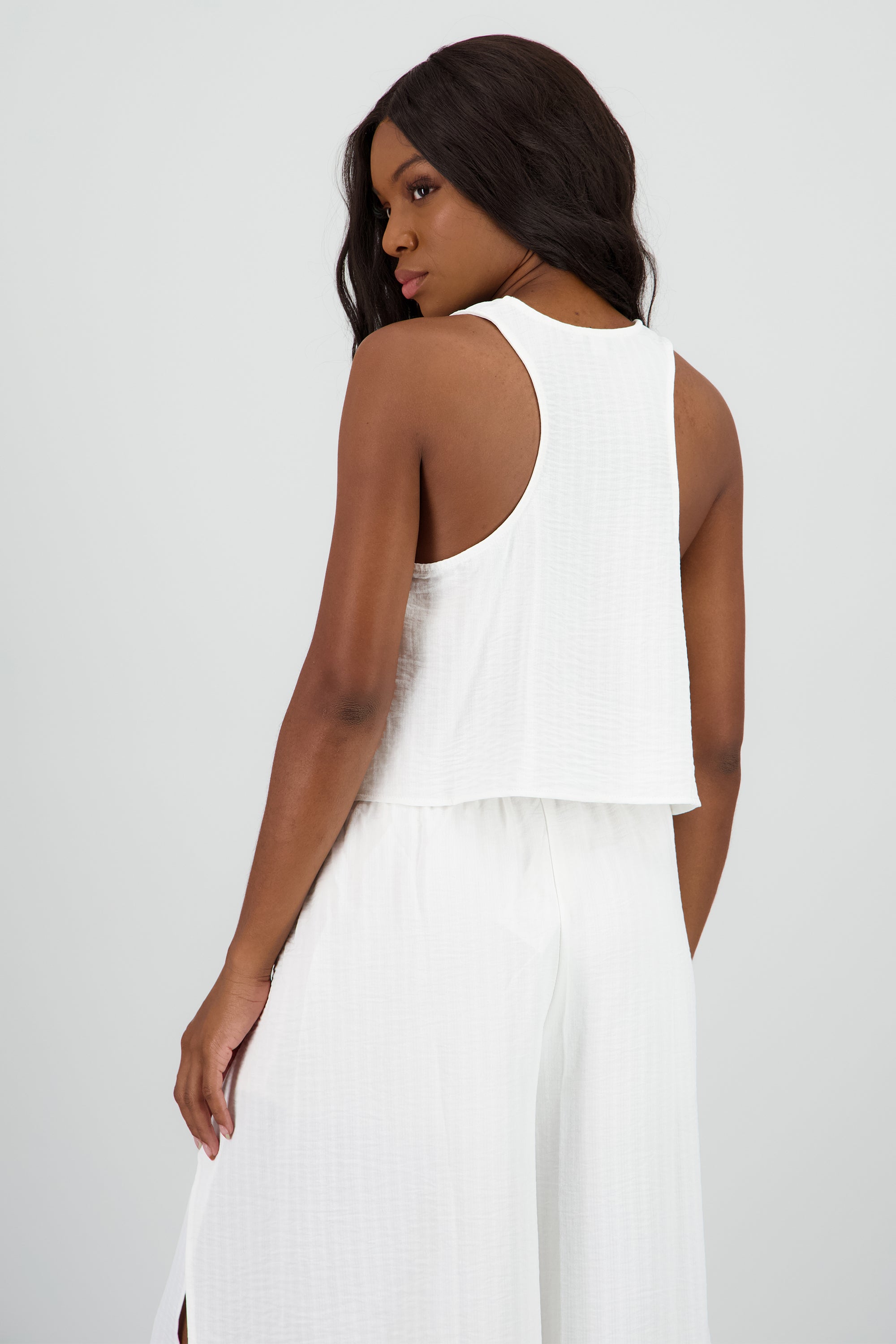 Blusa fluida textura sin manga BLANCO