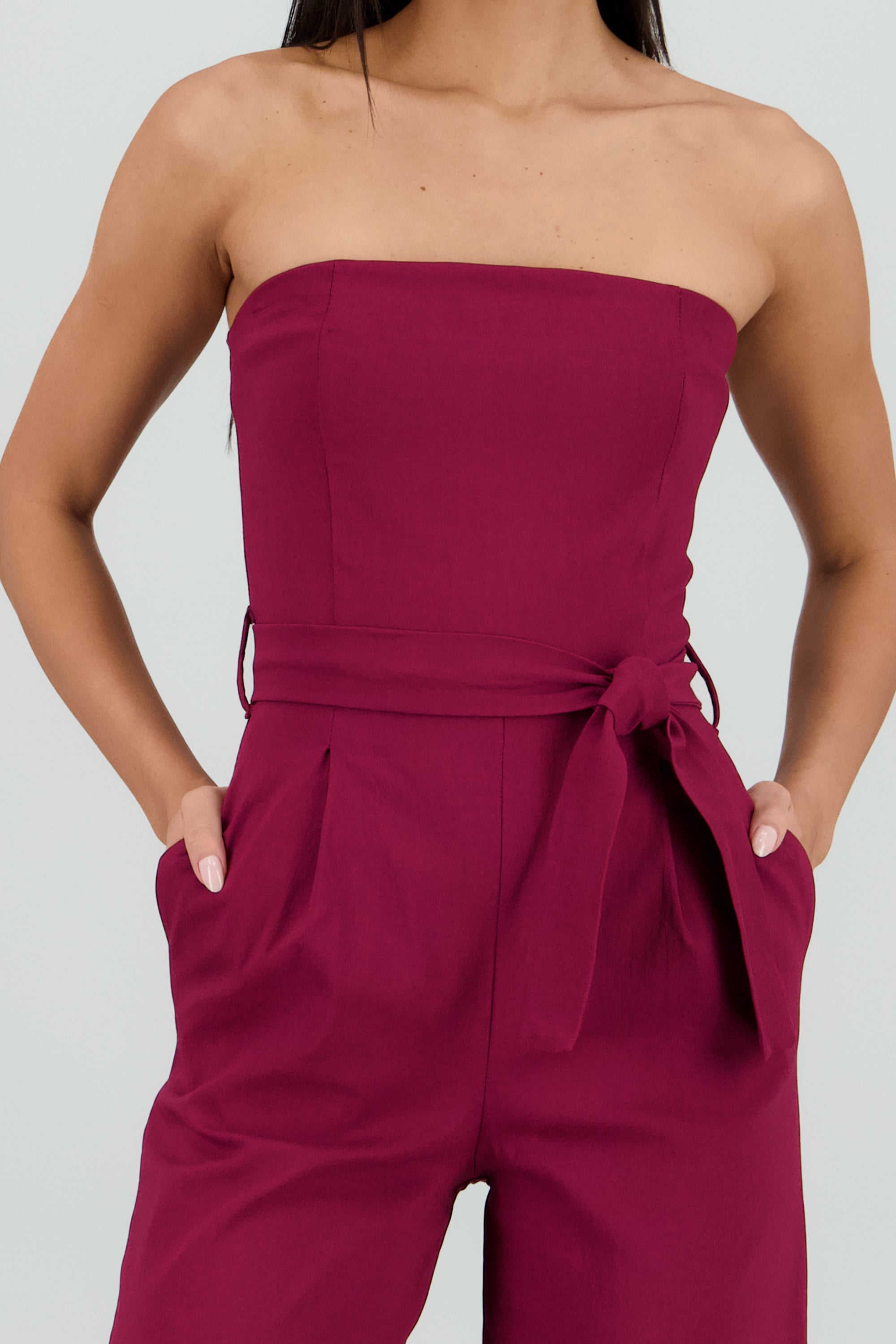Jumpsuit strapless detalle cinturon CIRUELA